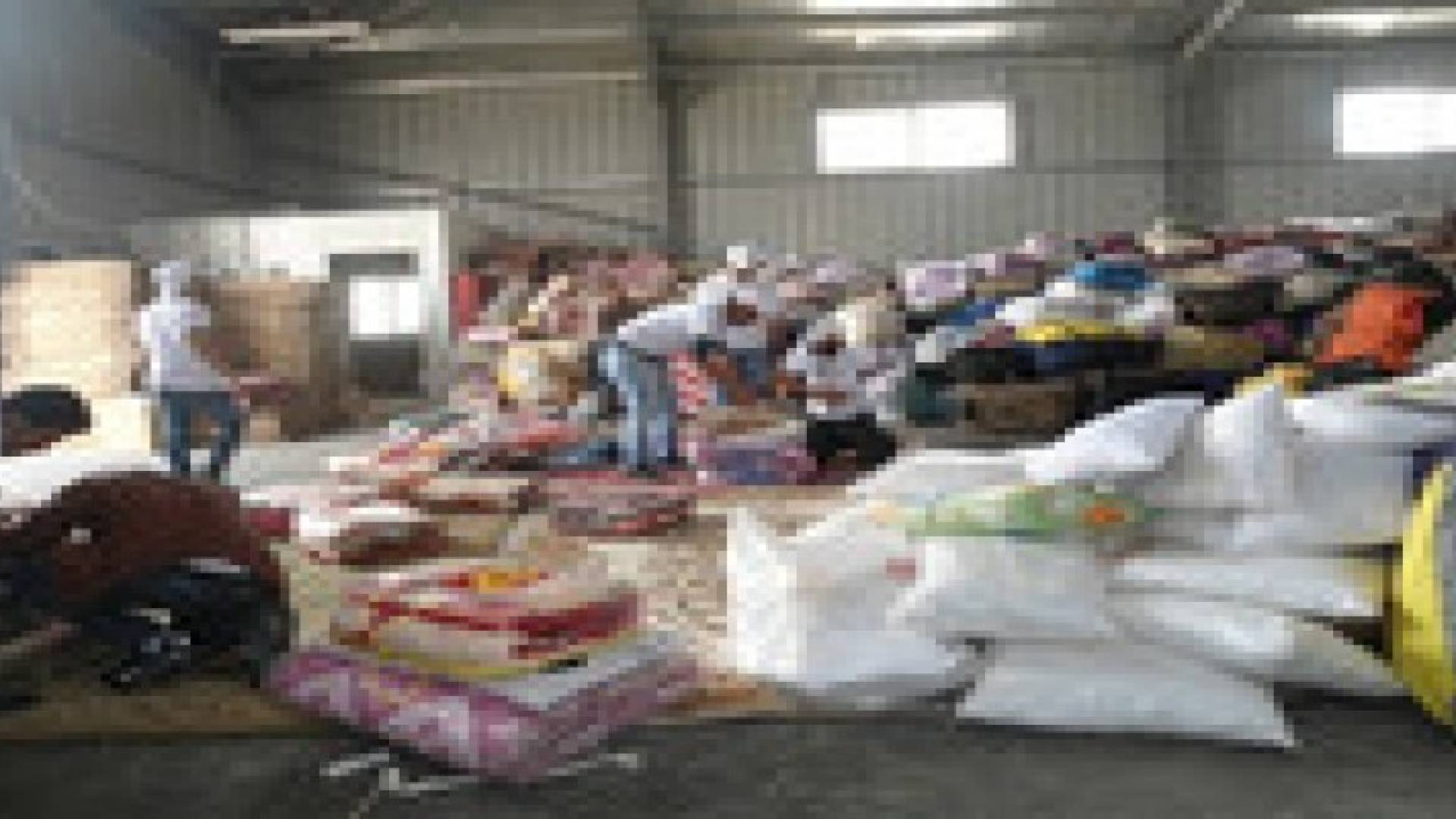 توزيع مساعدات لـ650 أسرة من اللاجئين السوريين