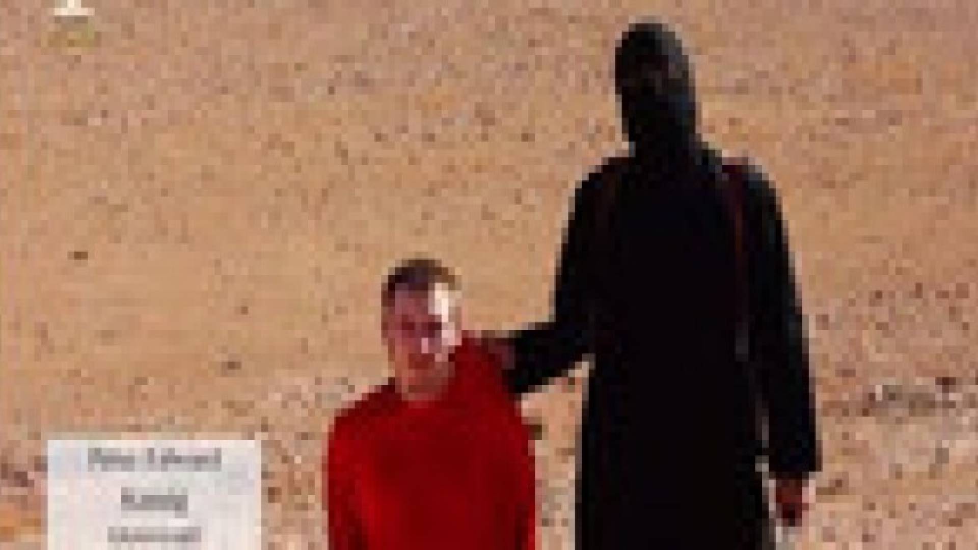 "داعش" يعدم الرهينة الأميركي بيتر كاسيغ .. فيديو