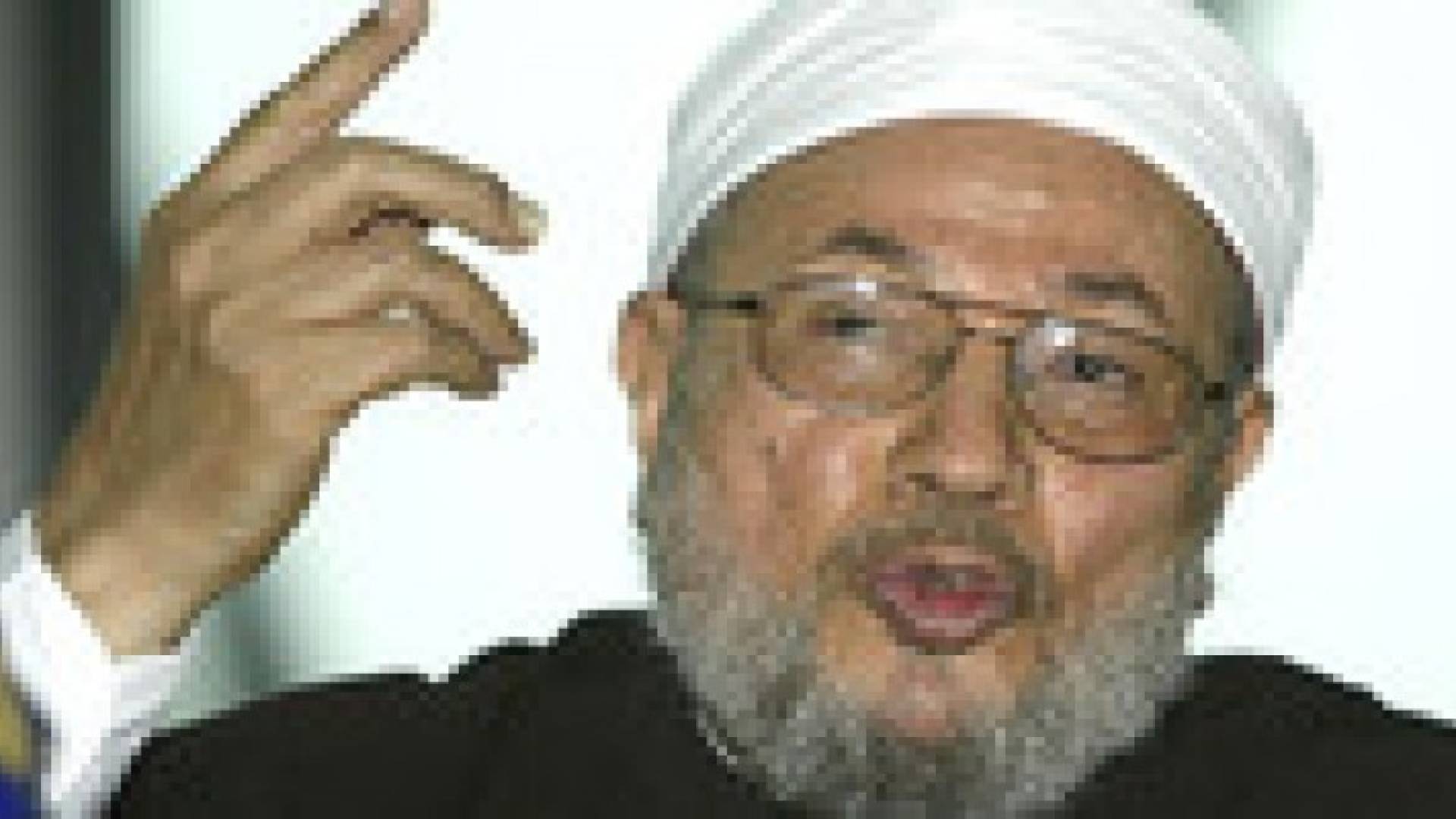 الانتربول الدولي يصدر النشرة الحمراء للقبض على القرضاوي