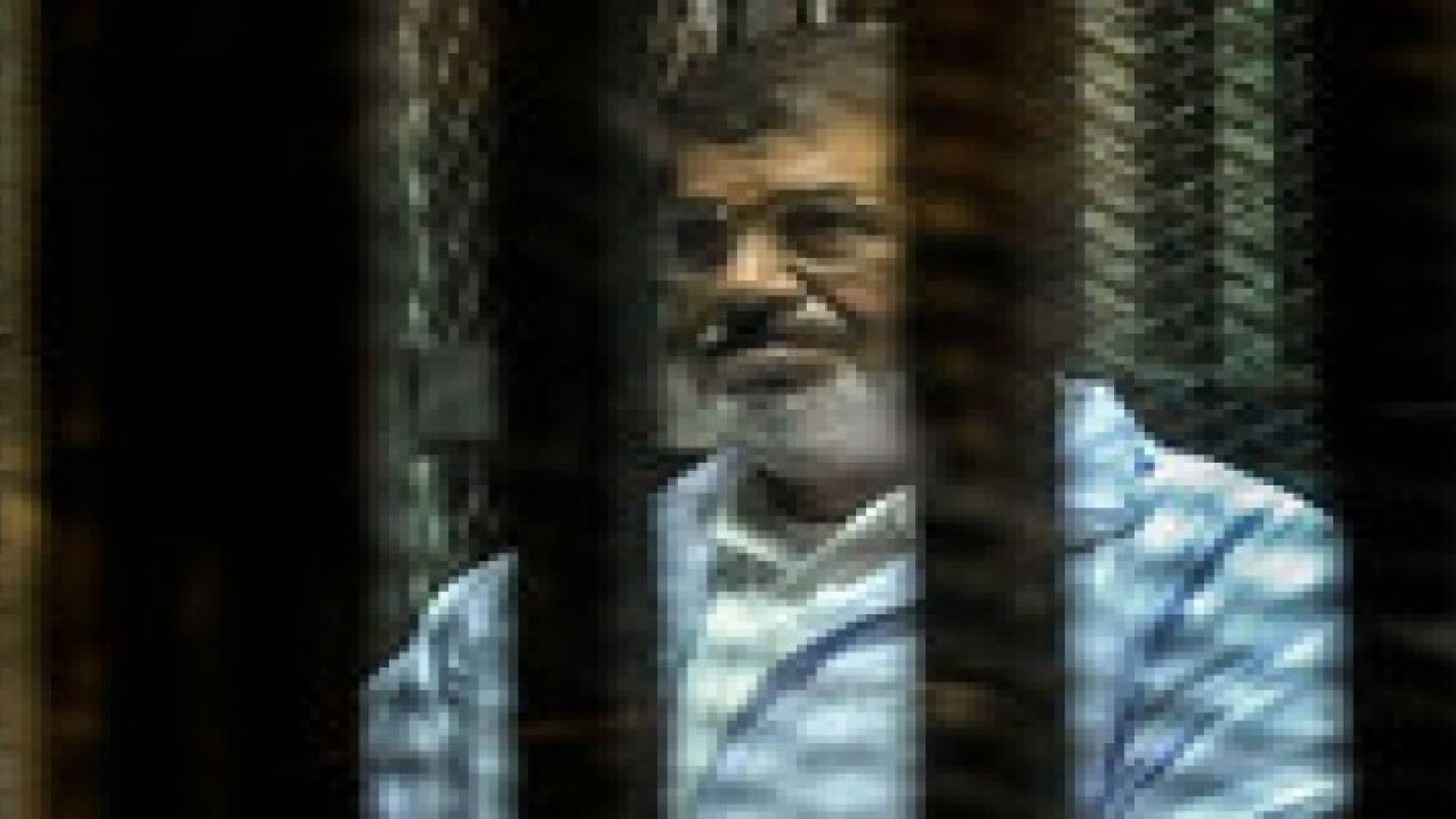 "مرسي" ينفي تحويل أموال لـ"غزة" والنيابة: مكان احتجازه لا يؤثر على القضية