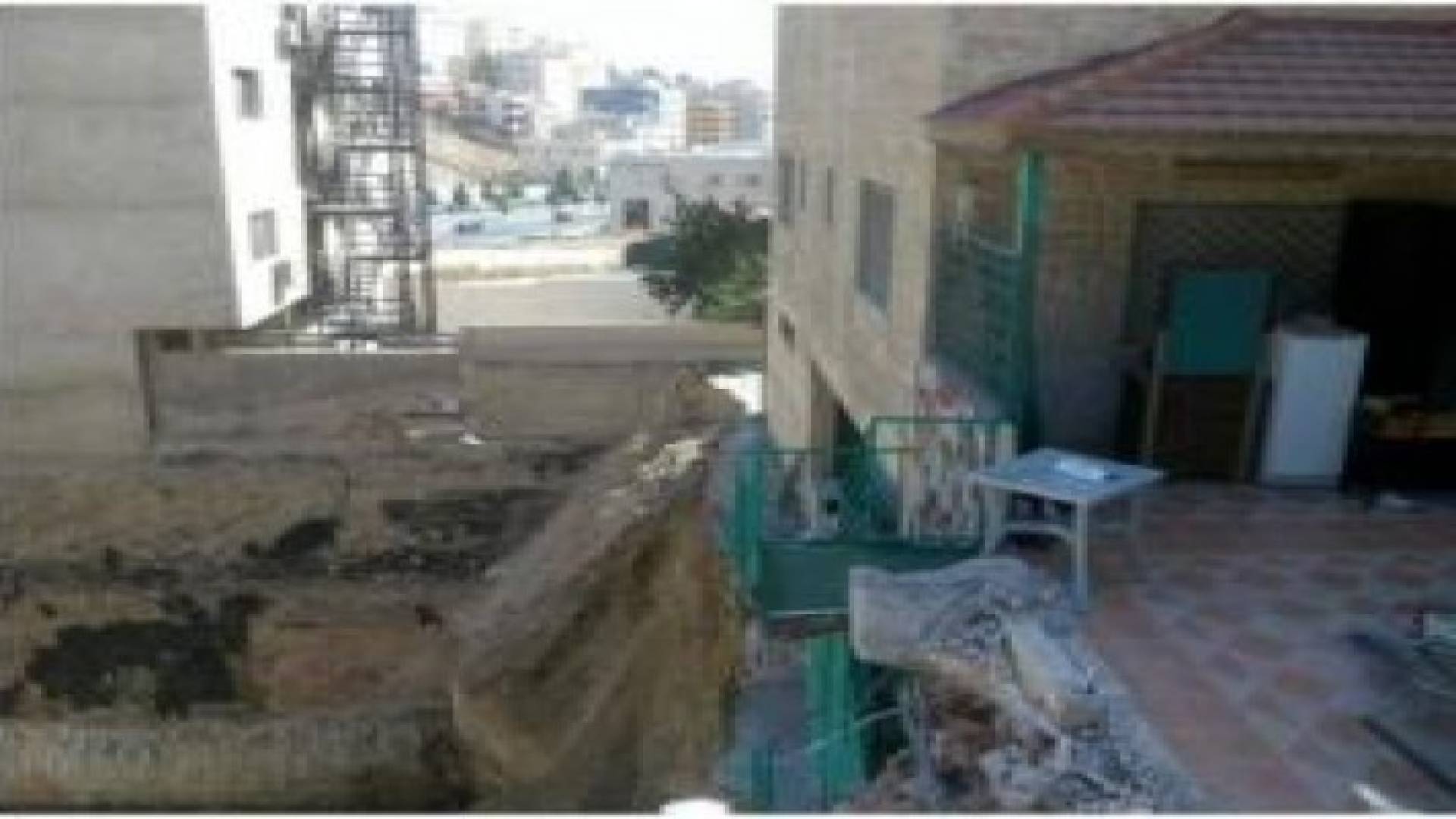 إخلاء سكان عمارة في صويلح.. صور وتفاصيل