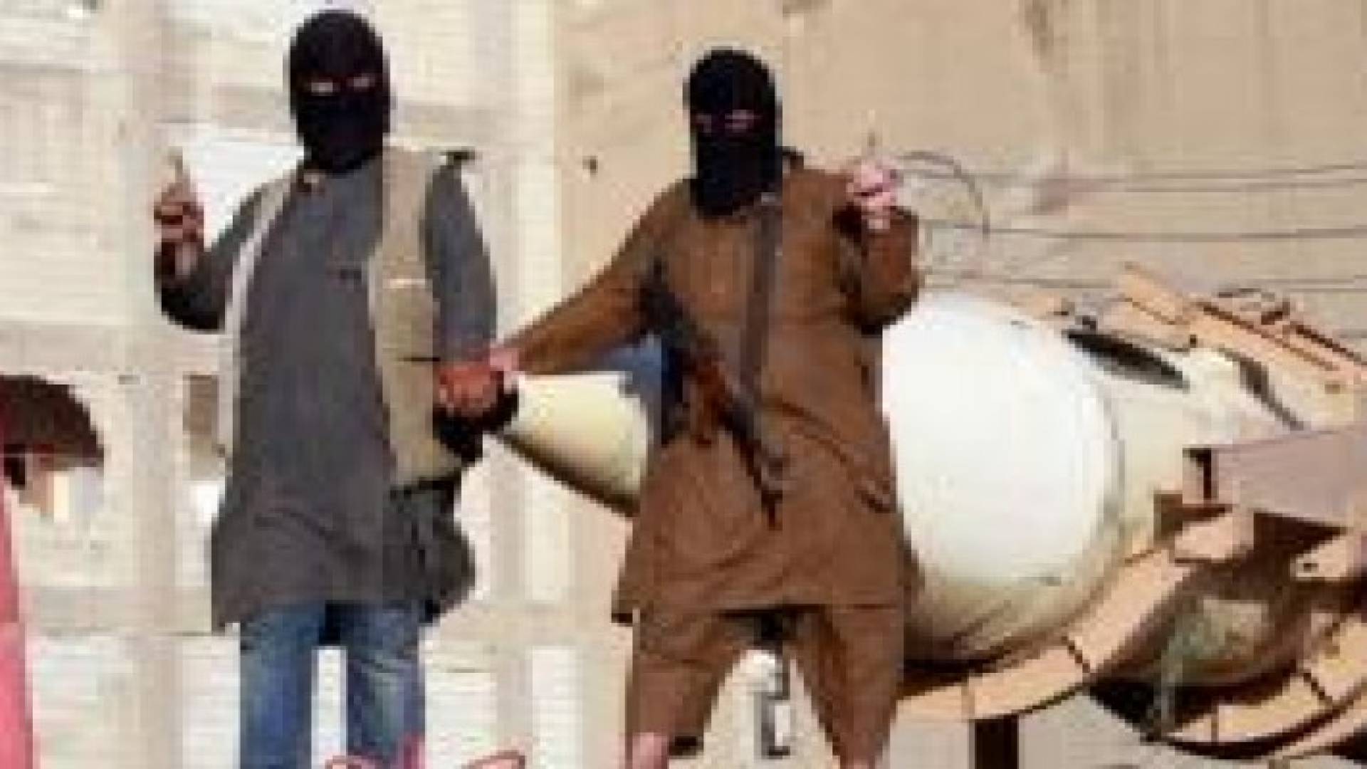 داعش يعلن إعدام رهينتين صيني ونرويجي