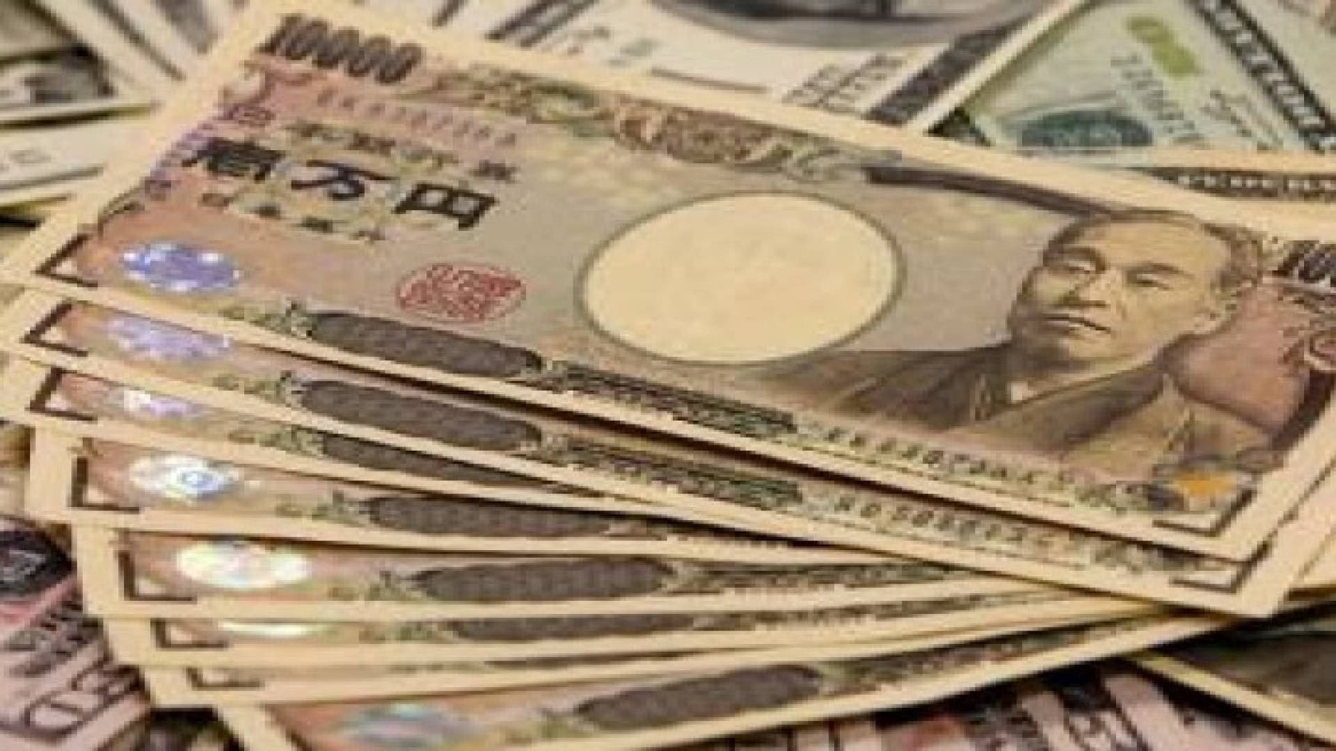 الين الياباني ينخفض مقابل الدولار إلى أدنى مستوياته في أسبوع