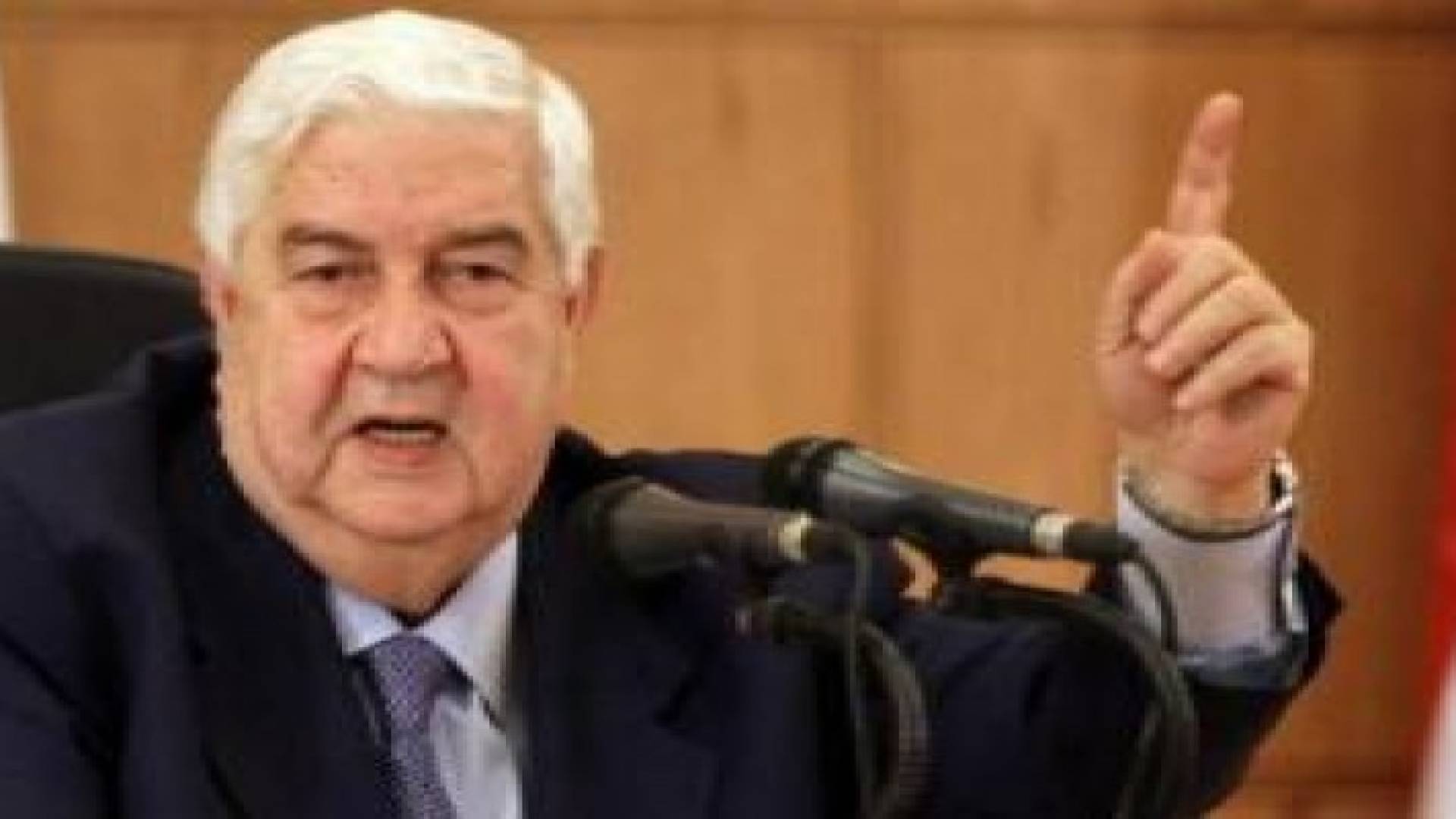 المعلم : سوريا مستعدة للمشاركة في محادثات السلام في جنيف
