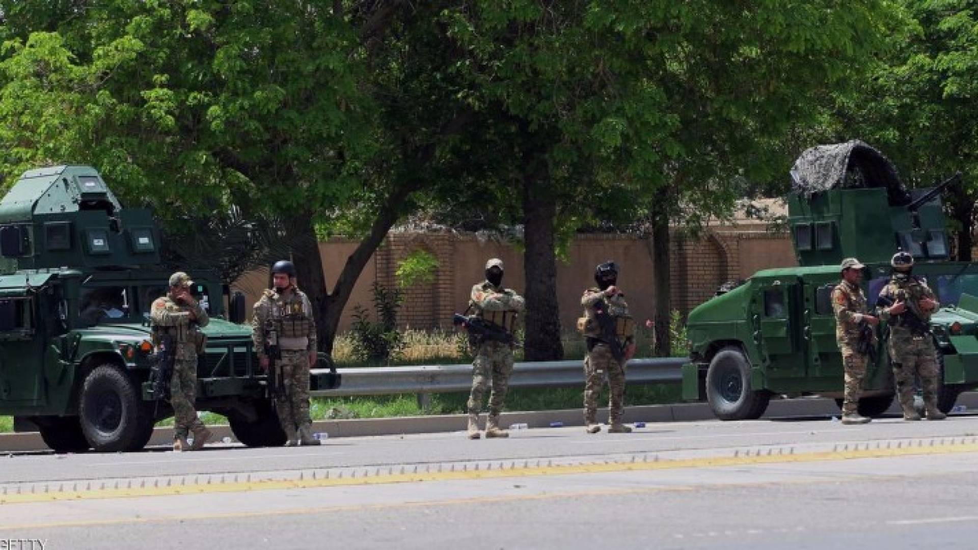 العراق : أسر قتلى الكرادة يحجتون والأمن يطلق الرصاص وقنابل الغاز
