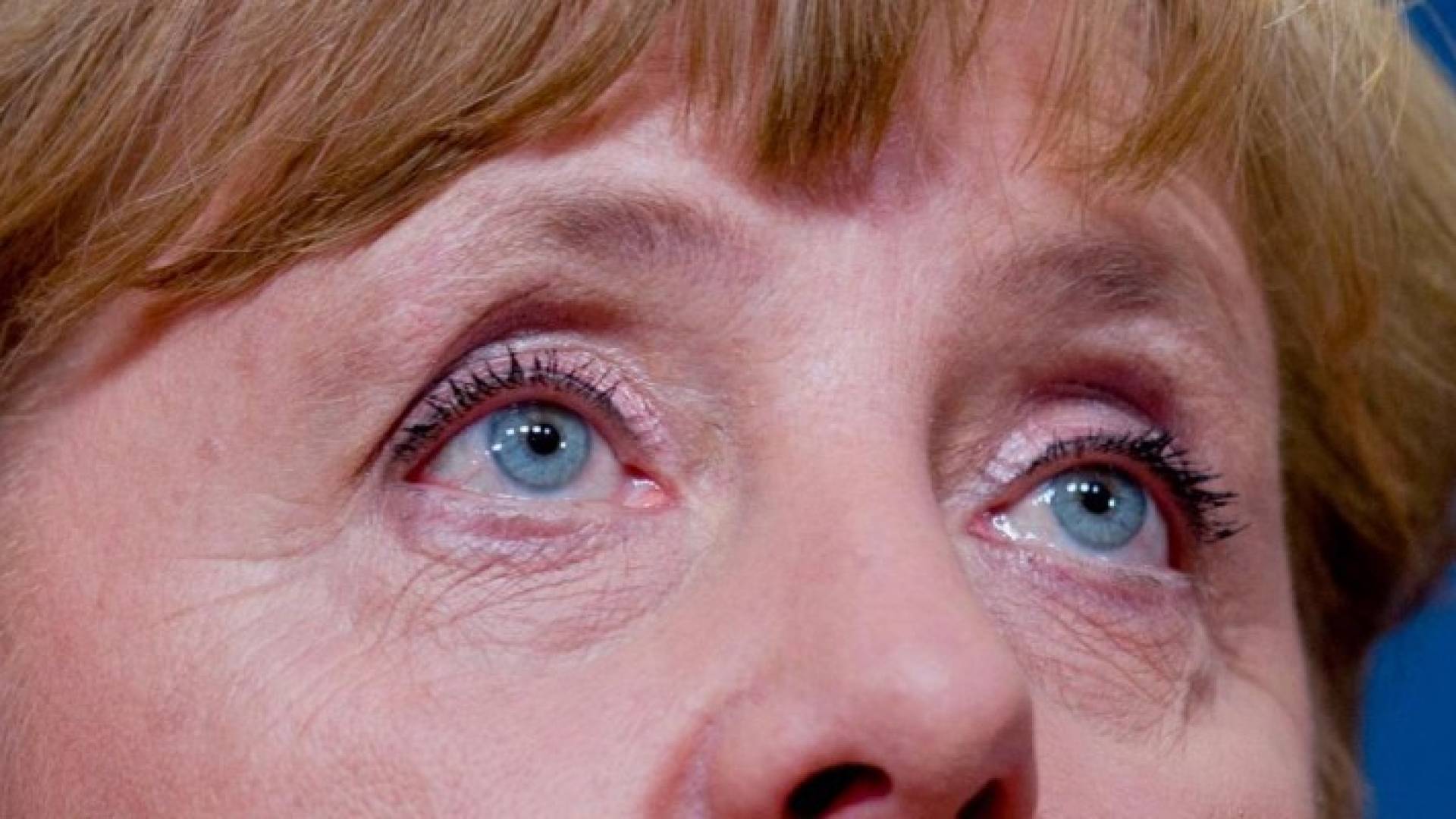 ميركل تتعهد بالقضاء على "الأعمال الوحشية"