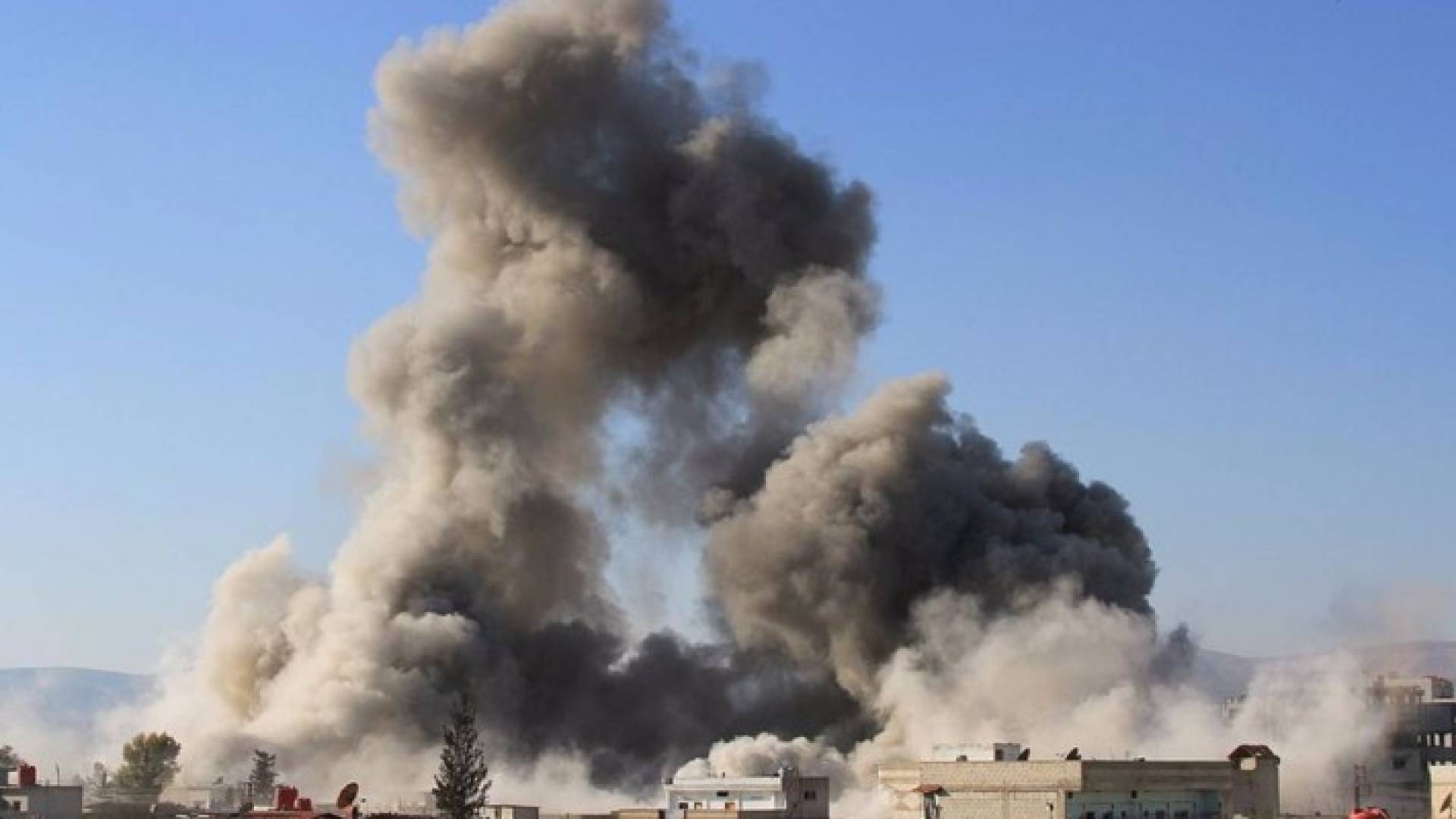 جانب من آثار إلقاء براميل متفجرة 