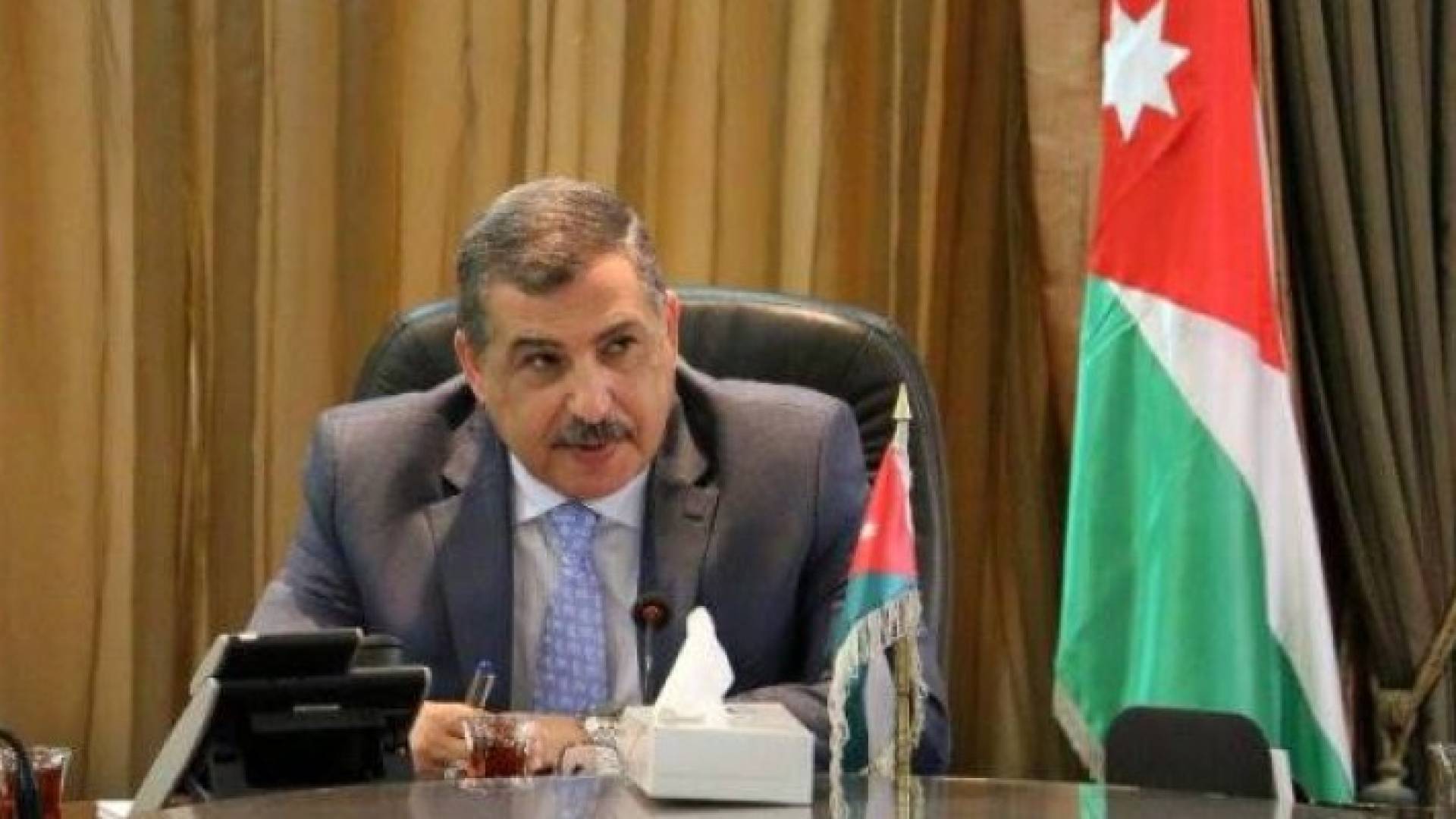 وزير العمل علي الغزاوي