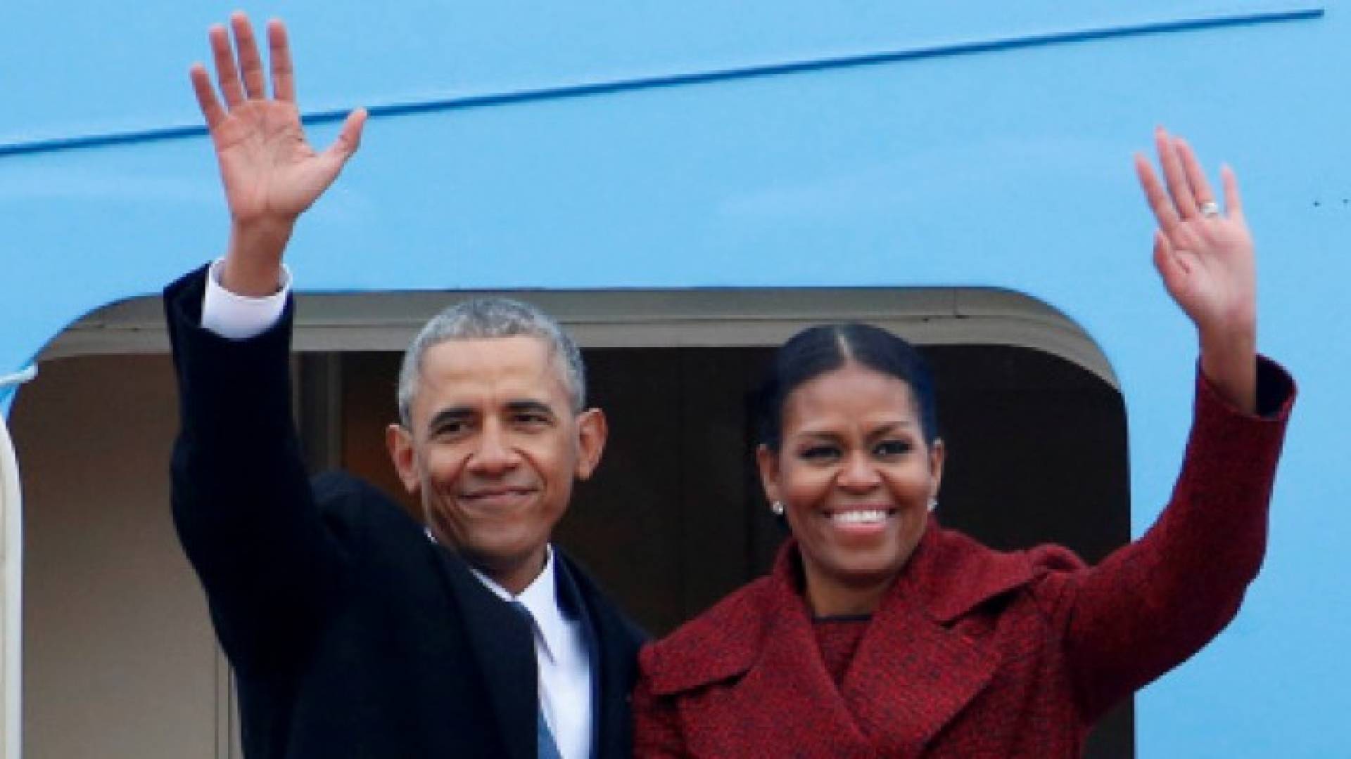 الرئيس الامريكي السابق باراك اوباما وزوجته 