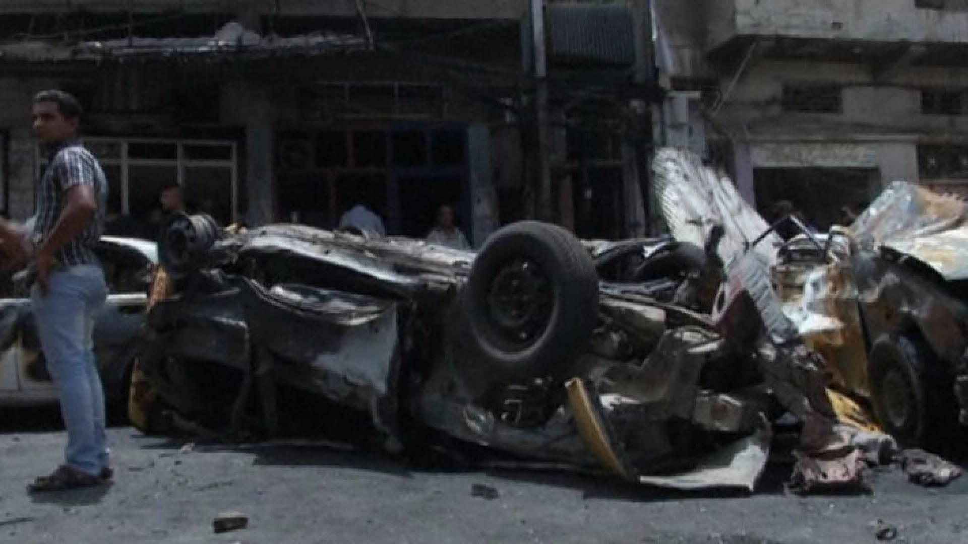 أرشيفية لآثار هجوم سابق بسيارة مفخخة في بغداد