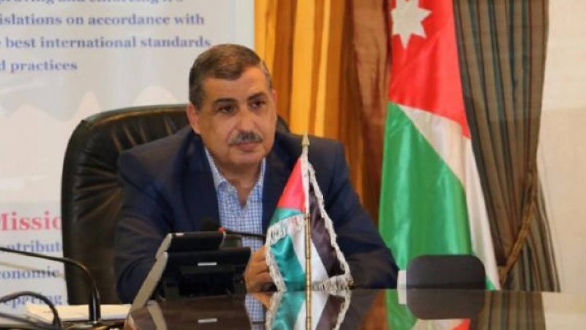 وزير العمل علي الغزاوي