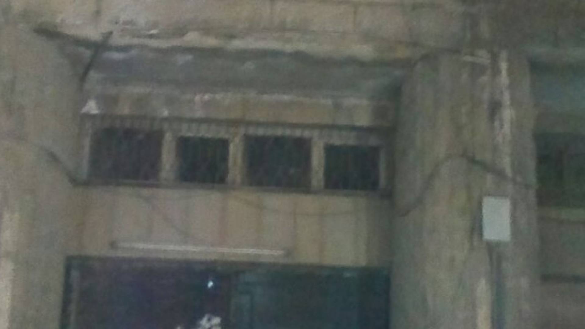 "التنمية" تزيل آرمة مركز المبني القديم لمنار اربد