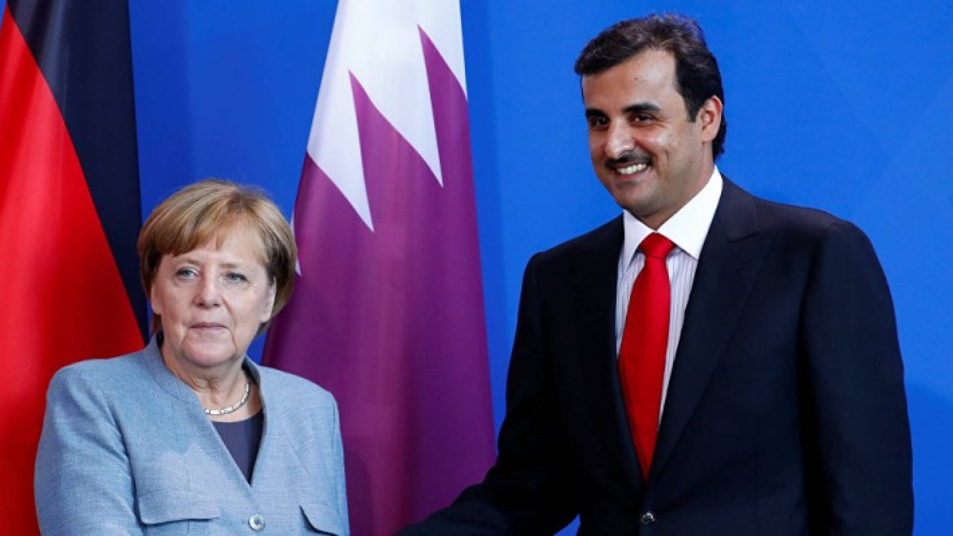 أمير قطر وميركل 
