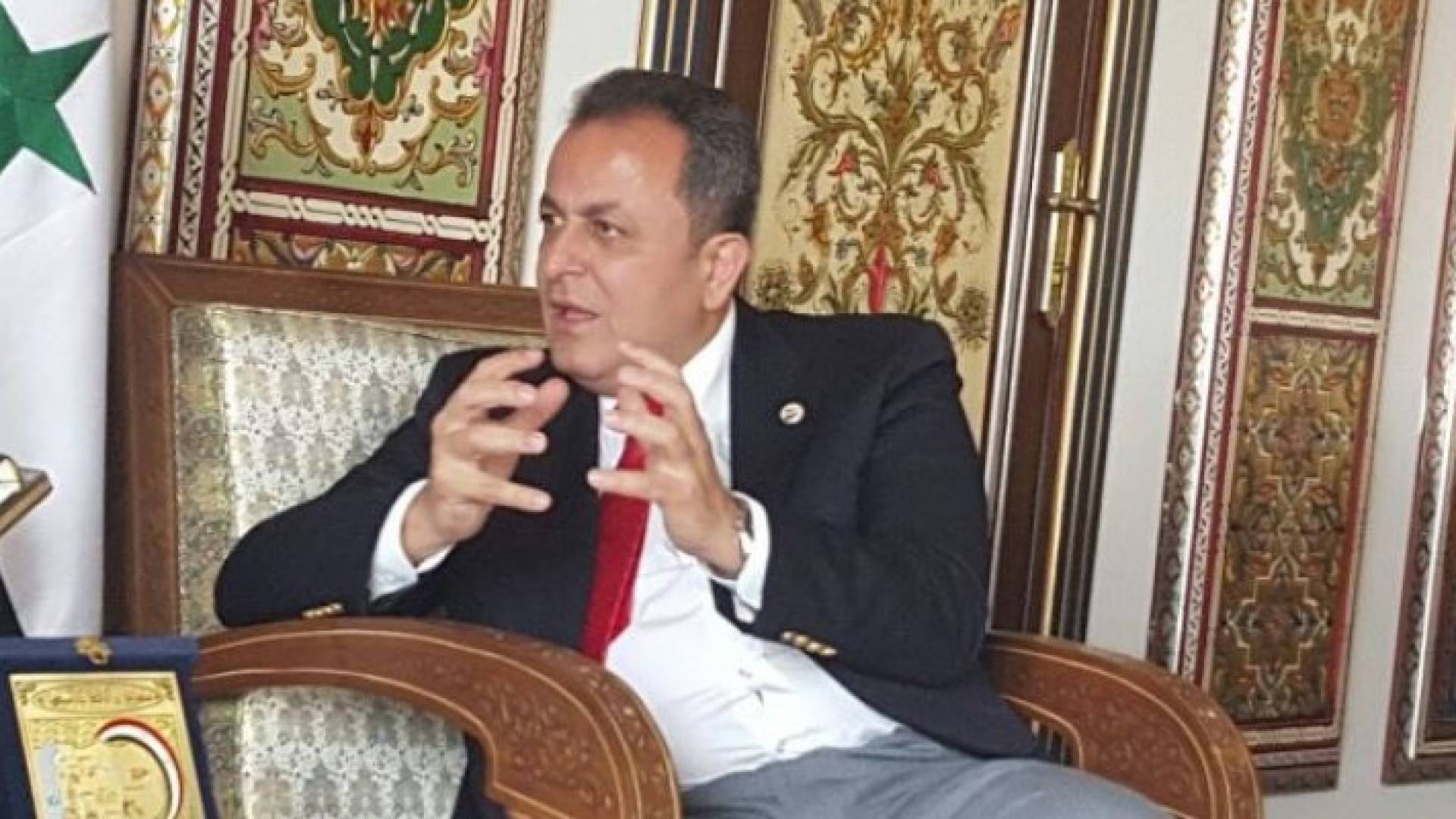 القائم بأعمال السفير السوري بعمان أيمن علوش