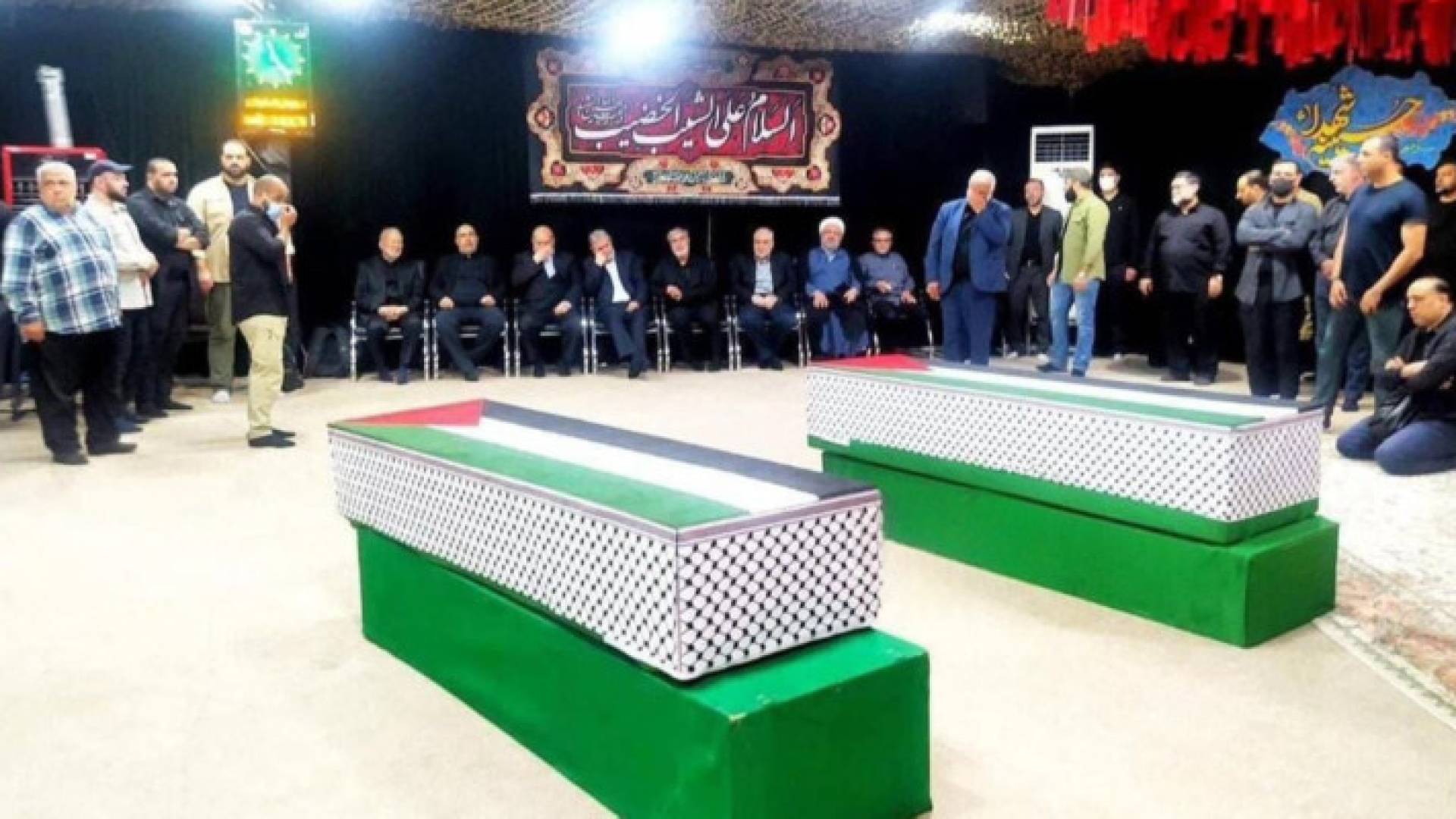 صورة وداع جثمان هنية ومرافقه وسيم أبو شعبان في طهران