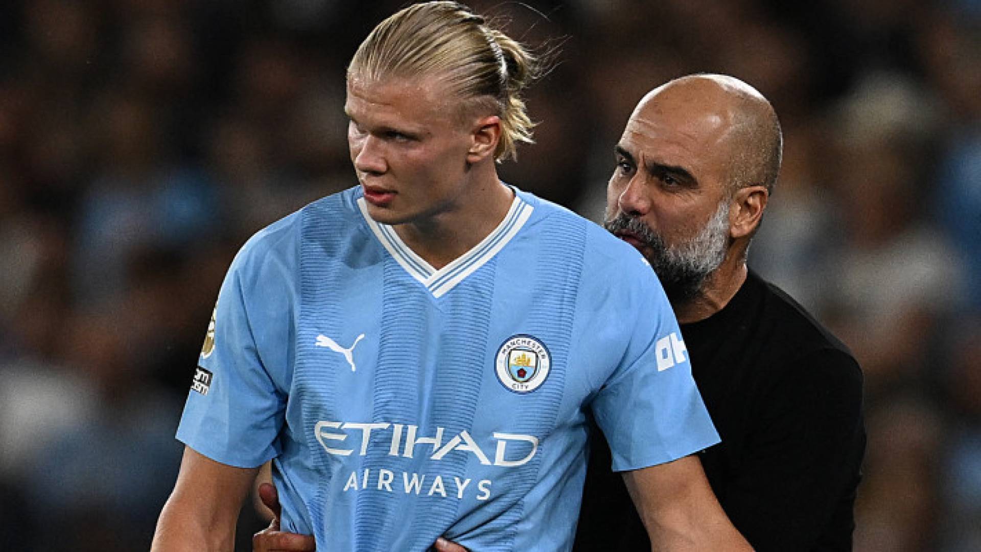 بيب جوارديولا ونجم مانشستر سيتي هالاند