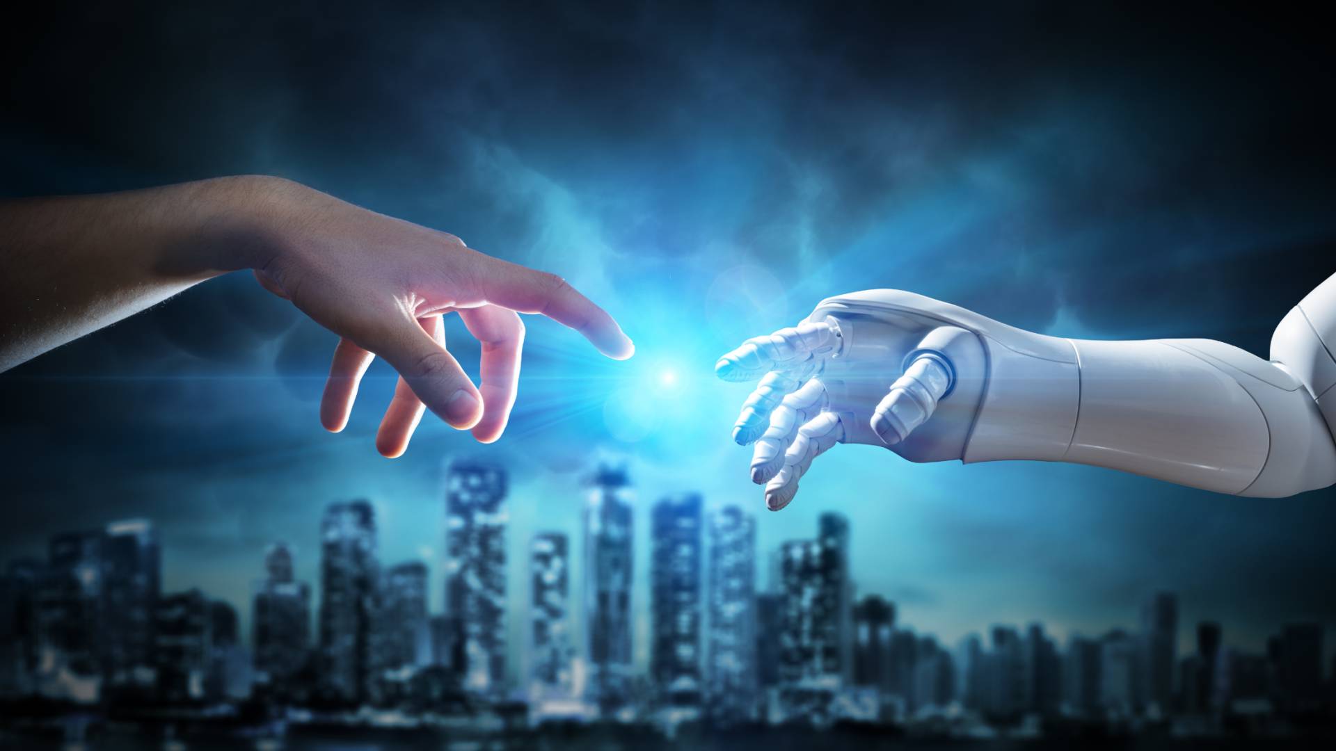 صورة تُظهر يد إنسان وذراع روبوت