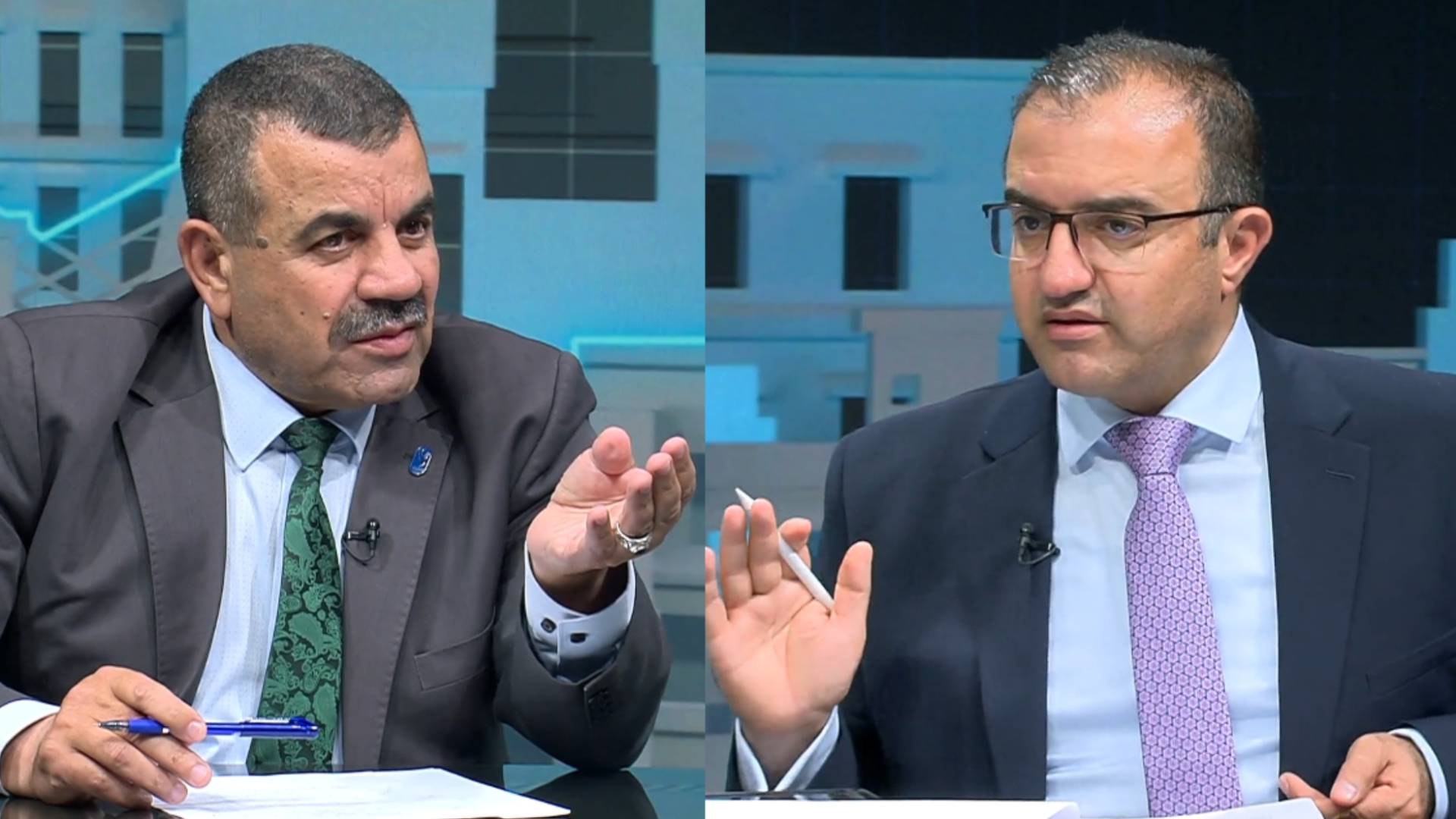 مدير مركز الحياة راصد عامر بني عامر (يمينا)، عضو مجلس النواب مصطفى العماوي  (يسارا)