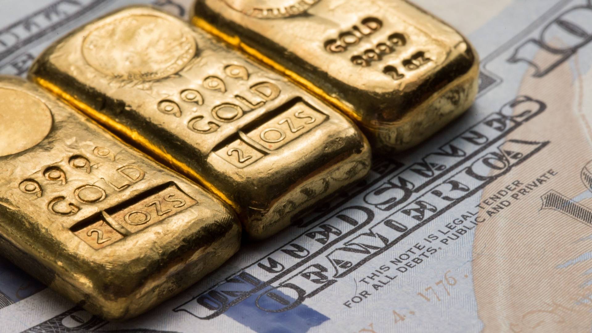 سبائك ذهبية فوق الدولار - تعبيرية