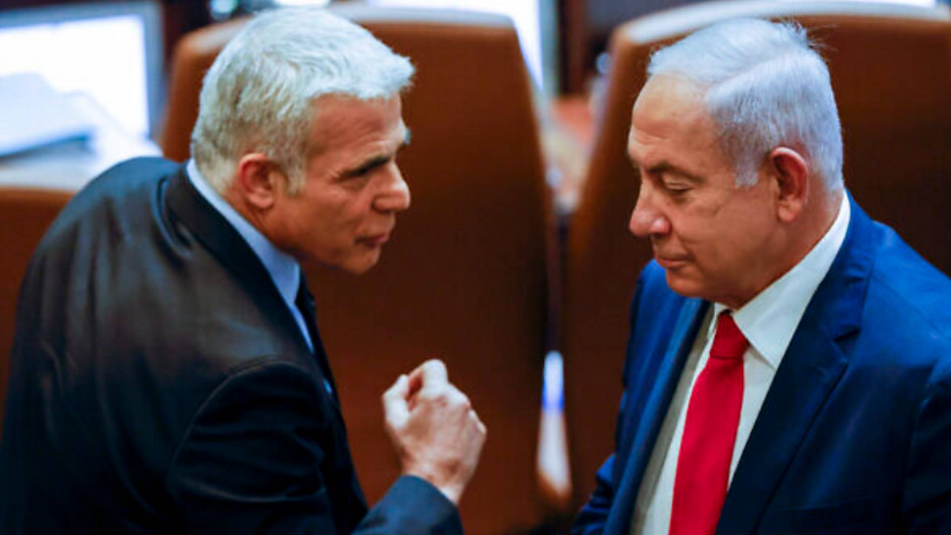 زعيم المعارضة يائير لابيدو رئيس حكومة الاحتلال بنيامين نتنياهو