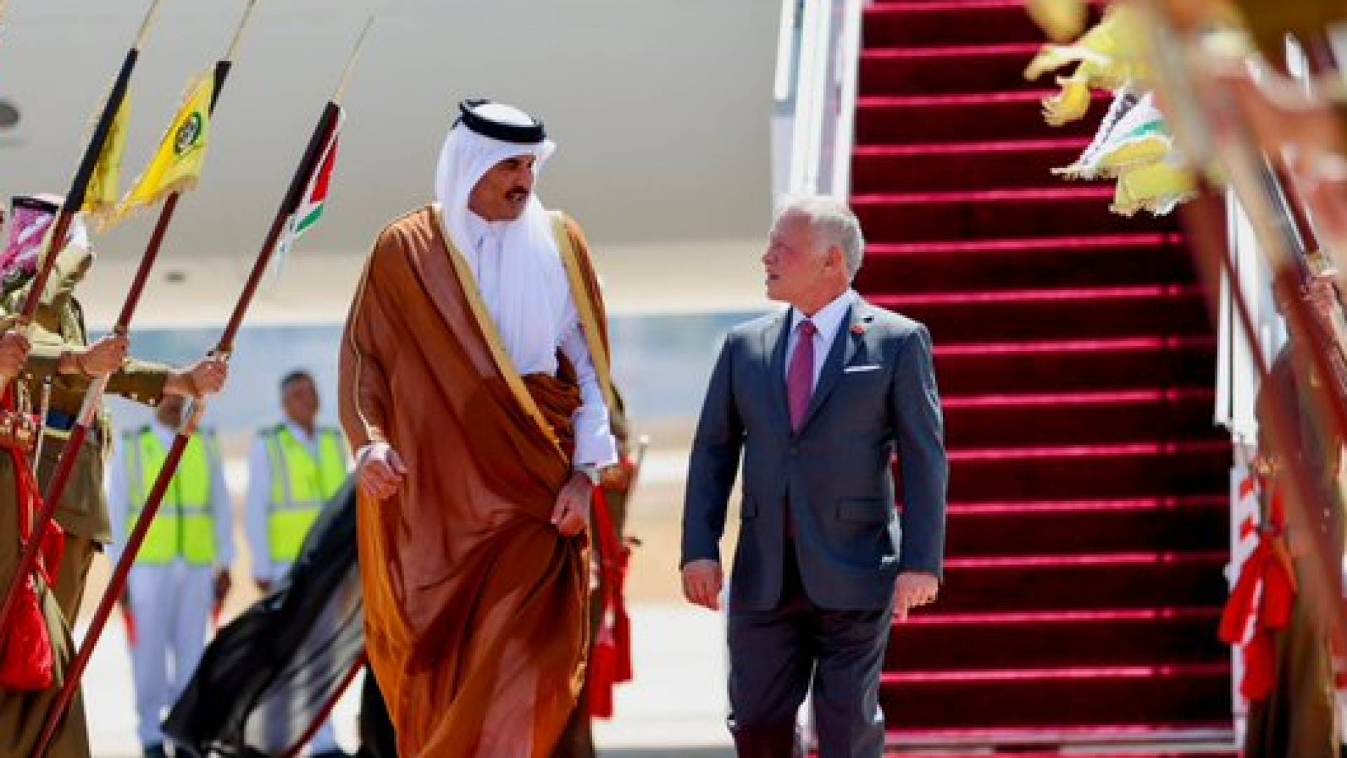 الملك وأمير قطر