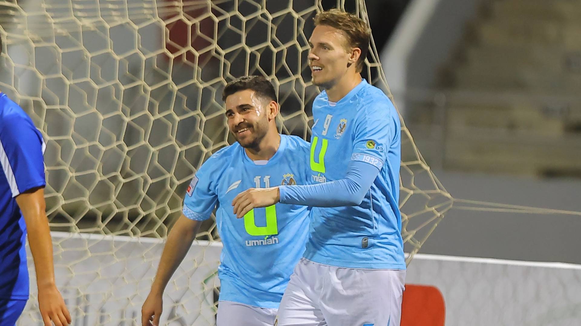 لاعبو الفيصلي يحتفلون بهدف