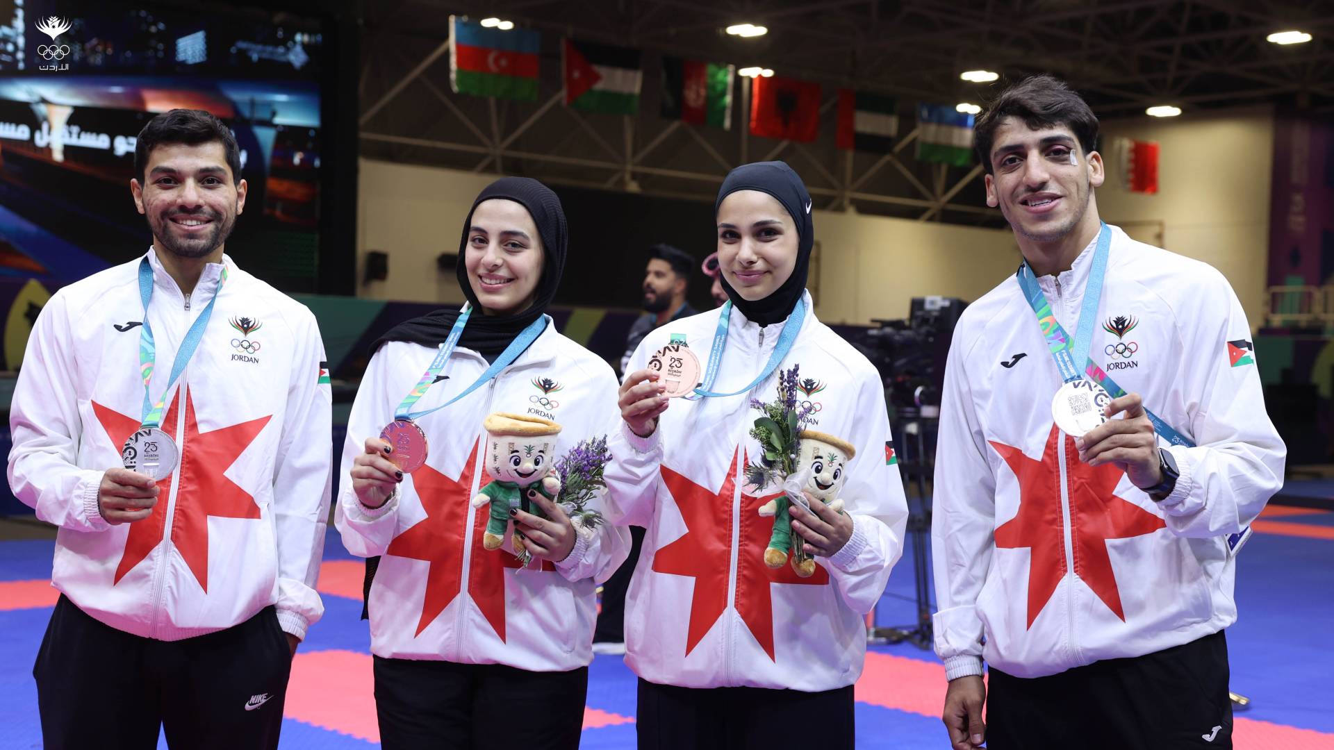 نجوم المنتخب الوطني والميداليات