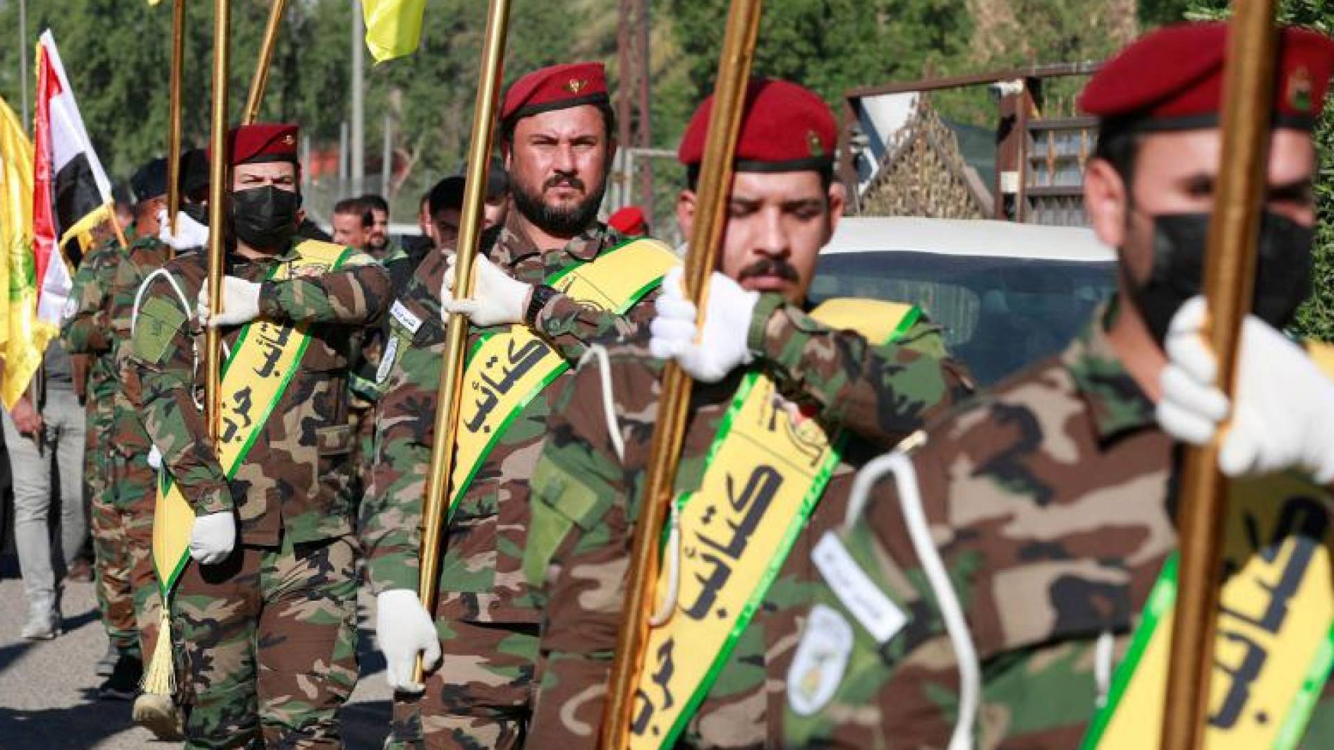 مقاتلون يتبعون كتائب "حزب الله" في العراق