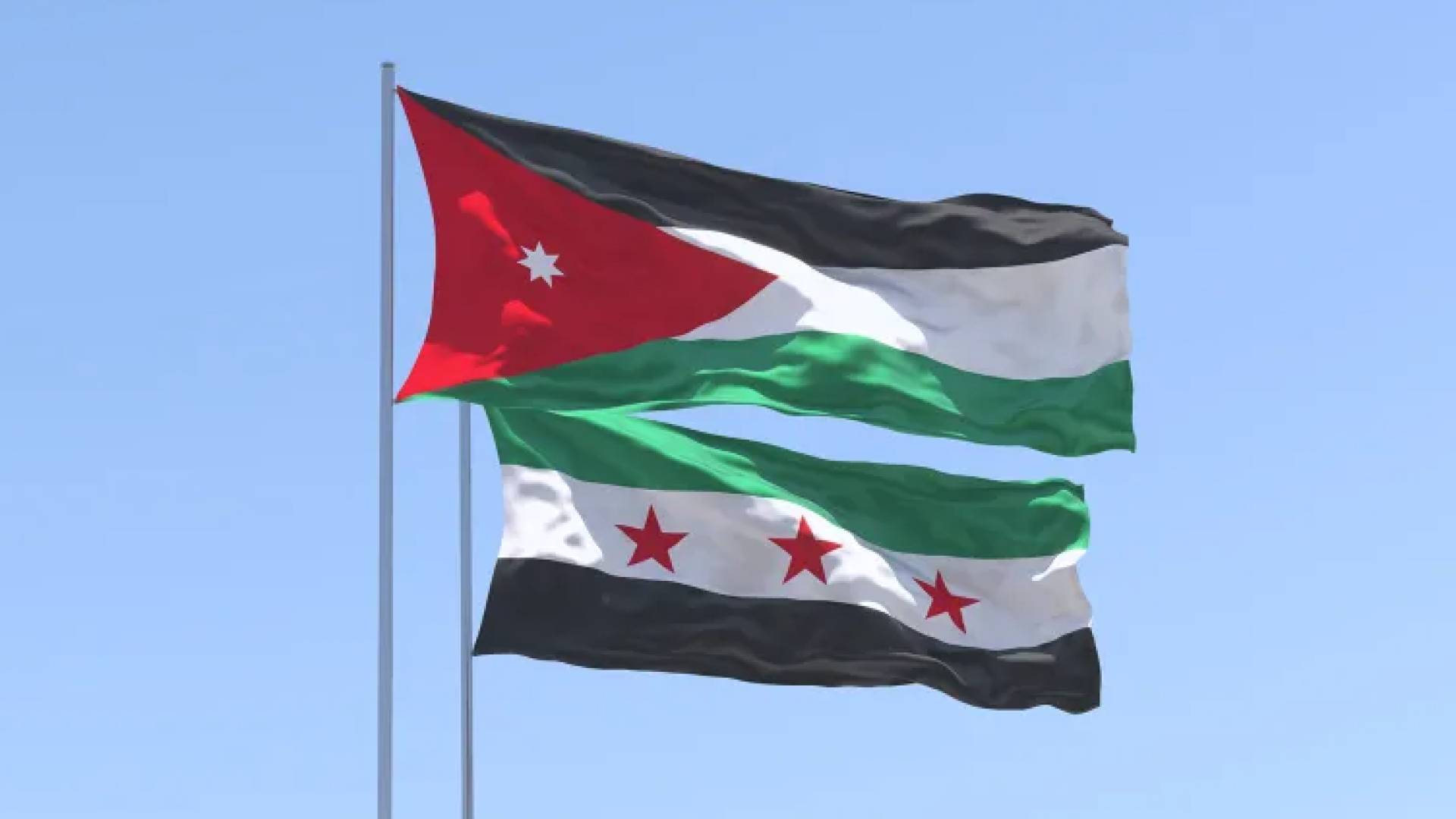 علم المملكة الأردنية الهاشمية وعلم الجمهورية العربية السورية