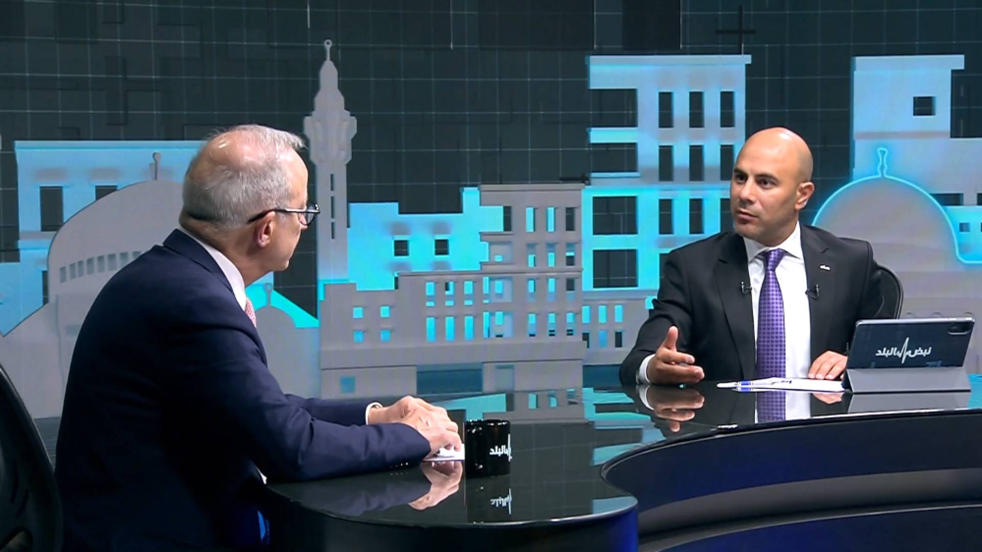 نائب رئيس الوزراء مروان المعشر ومقدم برنامج نبض البلد محمد الخالدي