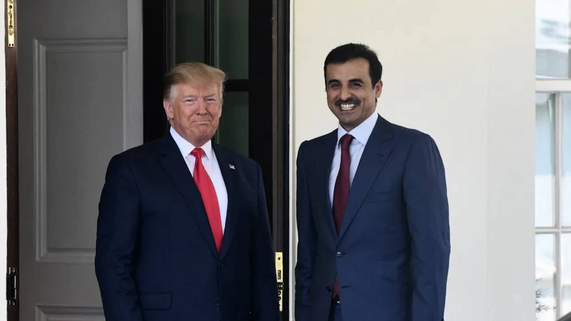 صورة الرئيس الأمريكي مع أمير  قطر