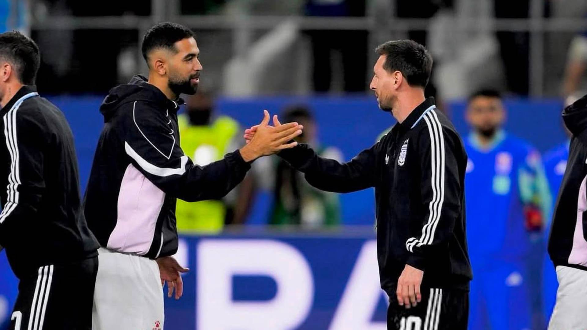 لاعب المنتخب الوطني علي علوان  و ميسي
