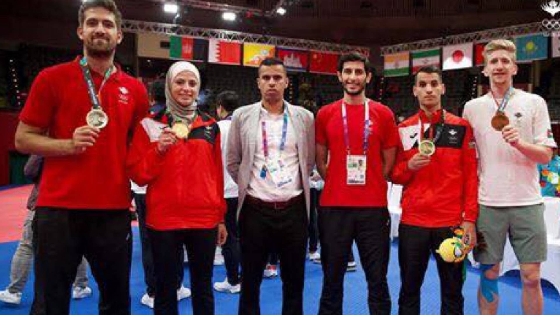 استقبال جماهيري كبير لمنتخب التايكواندو بعد انجاز الاسياد