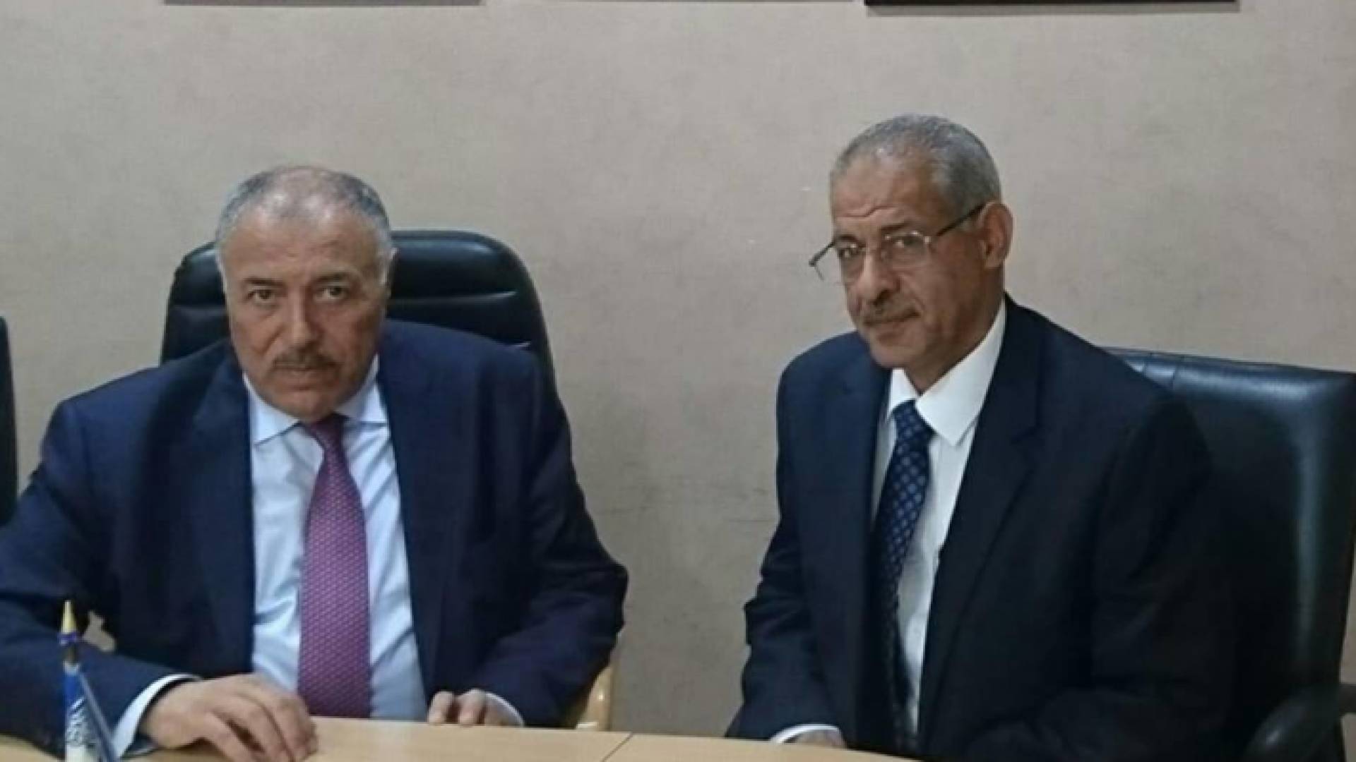 نقيب الأطباء الدكتور علي العبوس ووزير الصحة غازي الزبن