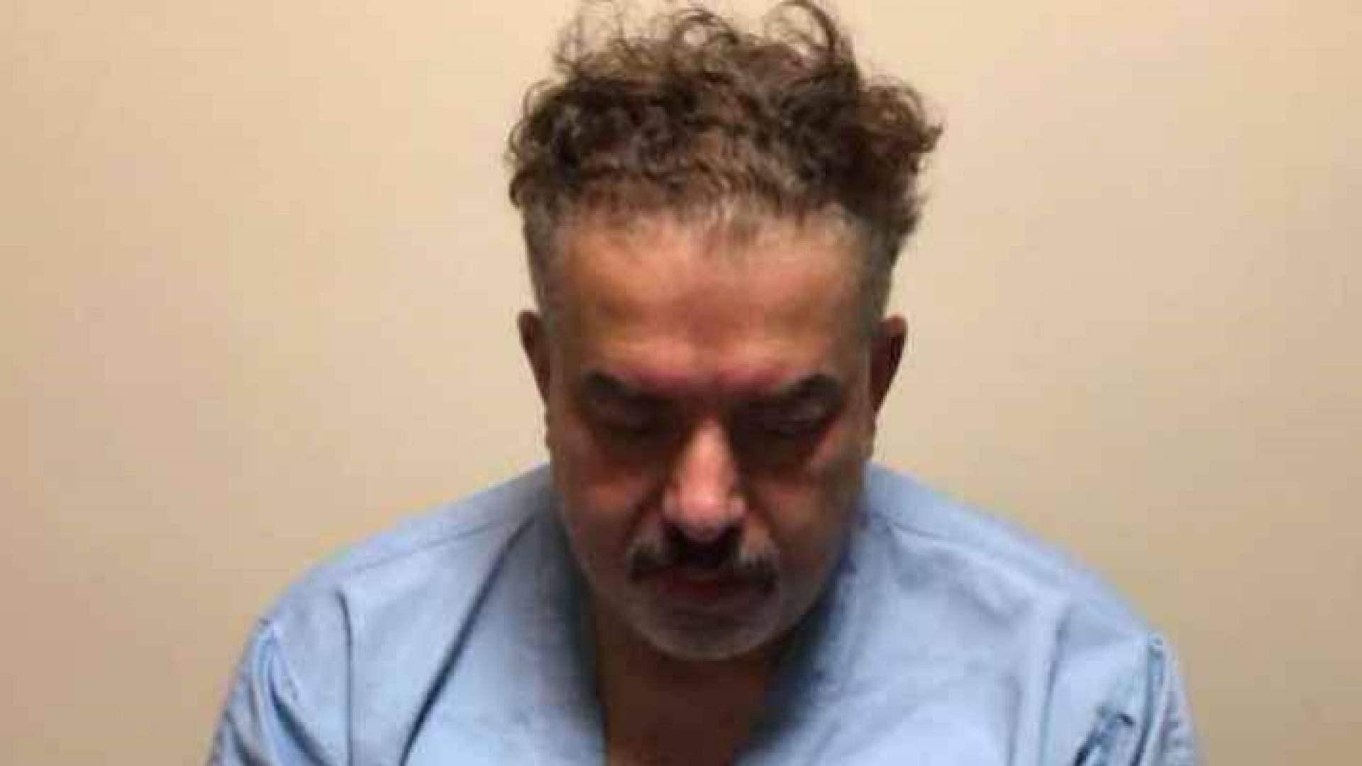 صورة نشرتها الحكومة للمتهم عوني مطيع بعد تسلمه من تركيا