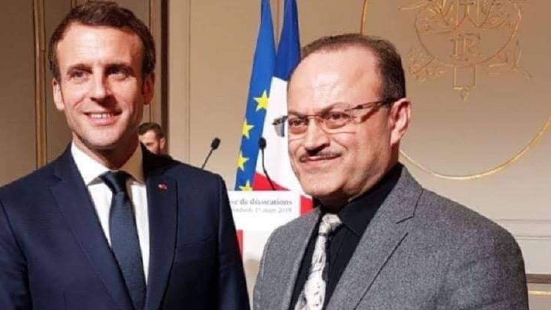 الرئيس الفرنسي مع الطبيب السوري عفيف عفيف