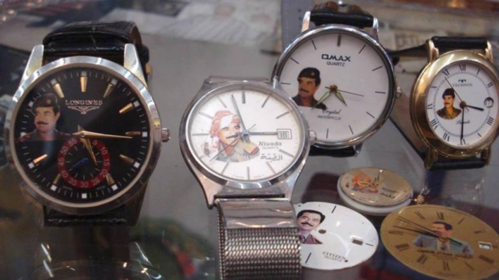 رفع أي شعارات أو صور لأقطاب النظام العراقي السابق يعد مخالفا للقانون في العراق