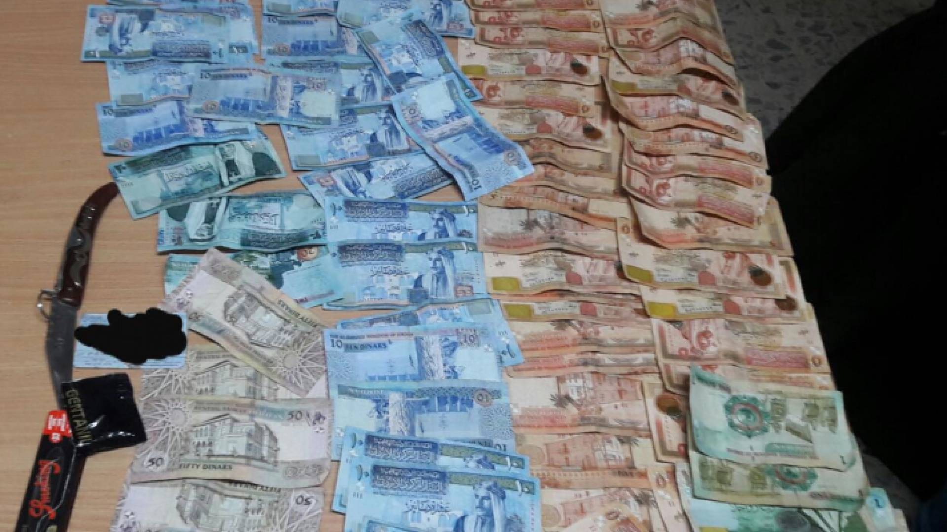 سلب صيدلية في اربد والامن يلقي القبض على الفاعل - صورة