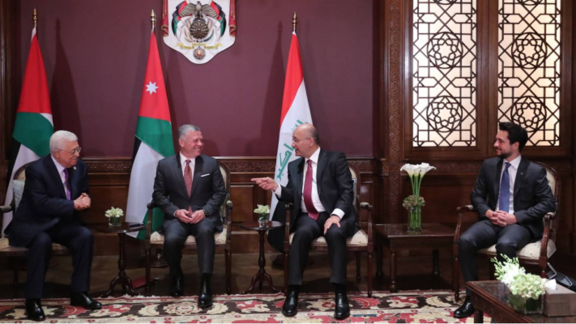 جلالة الملك ولي العهد والرئيسين العراقي الفلسطيني