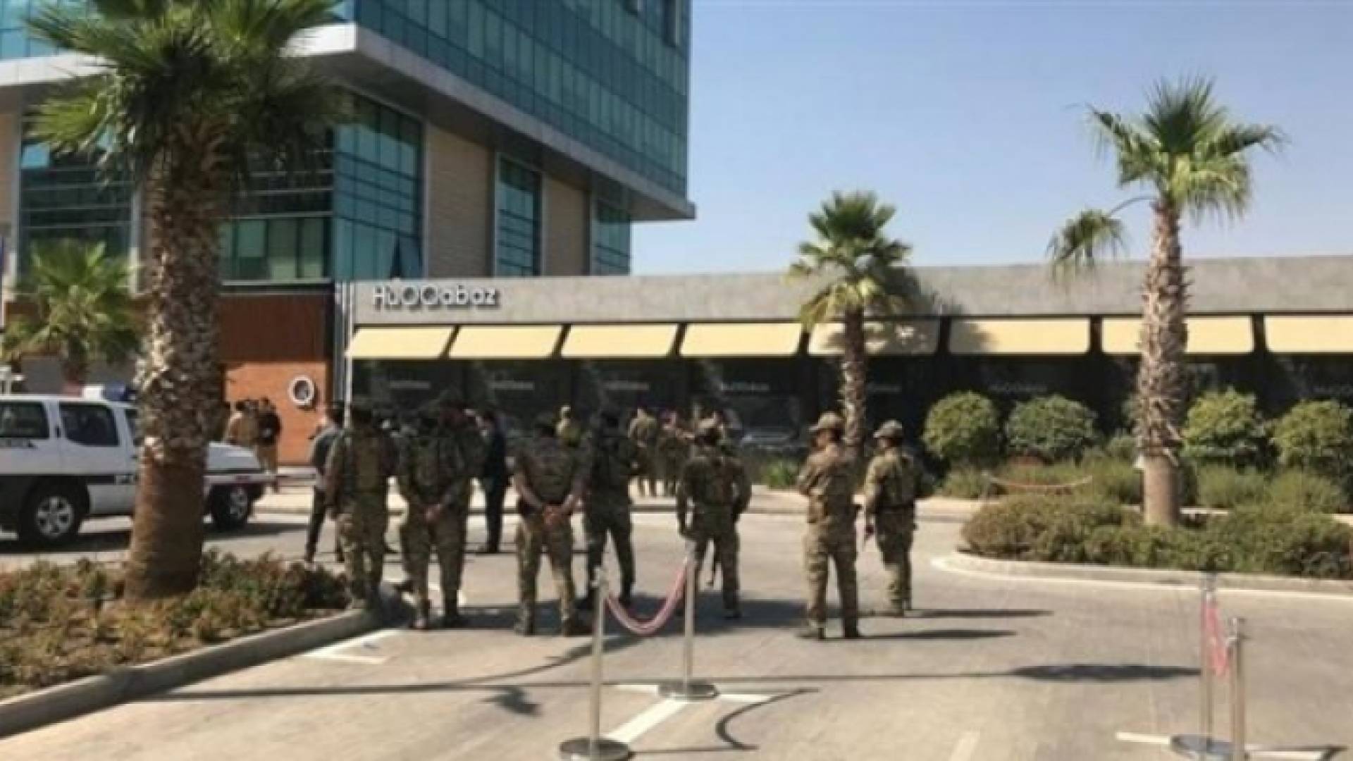 قوات أمن بموقع الهجوم المسلح في أربيل