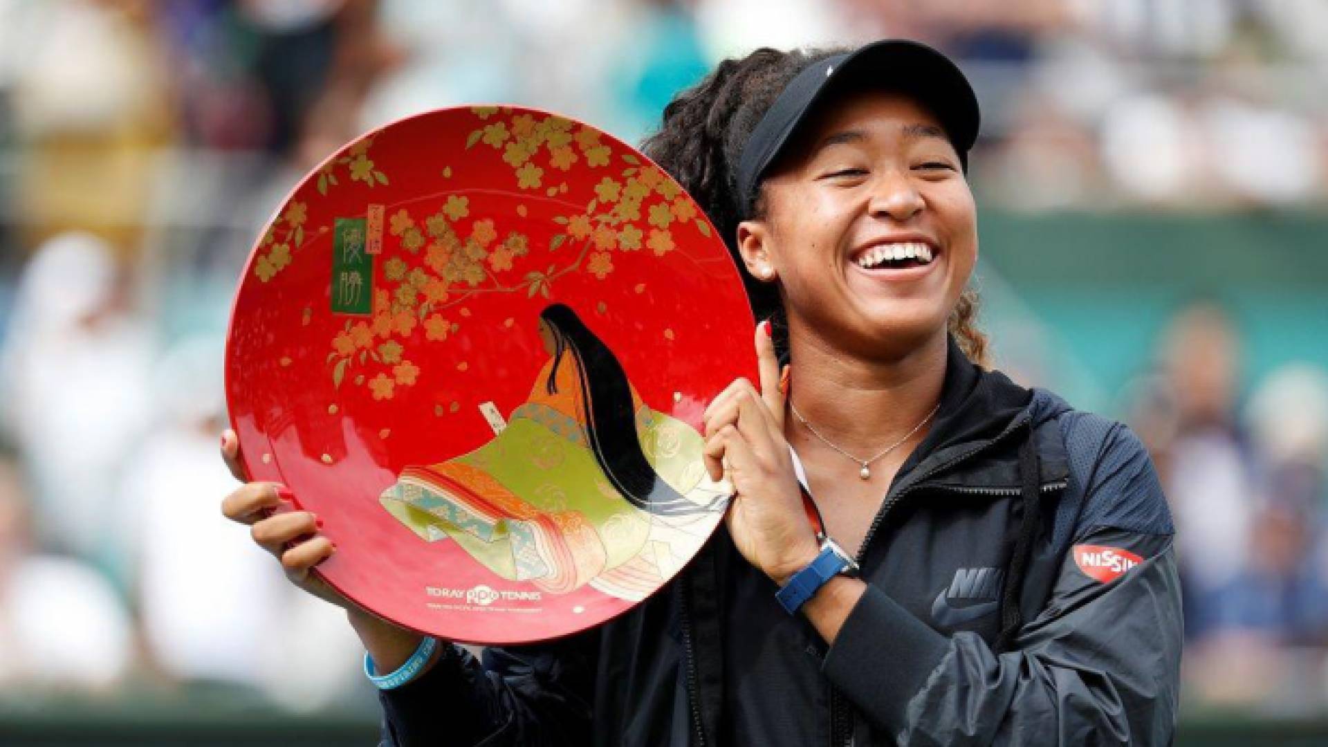 أوساكا تتوج في مسقط رأسها للمرة الأولى