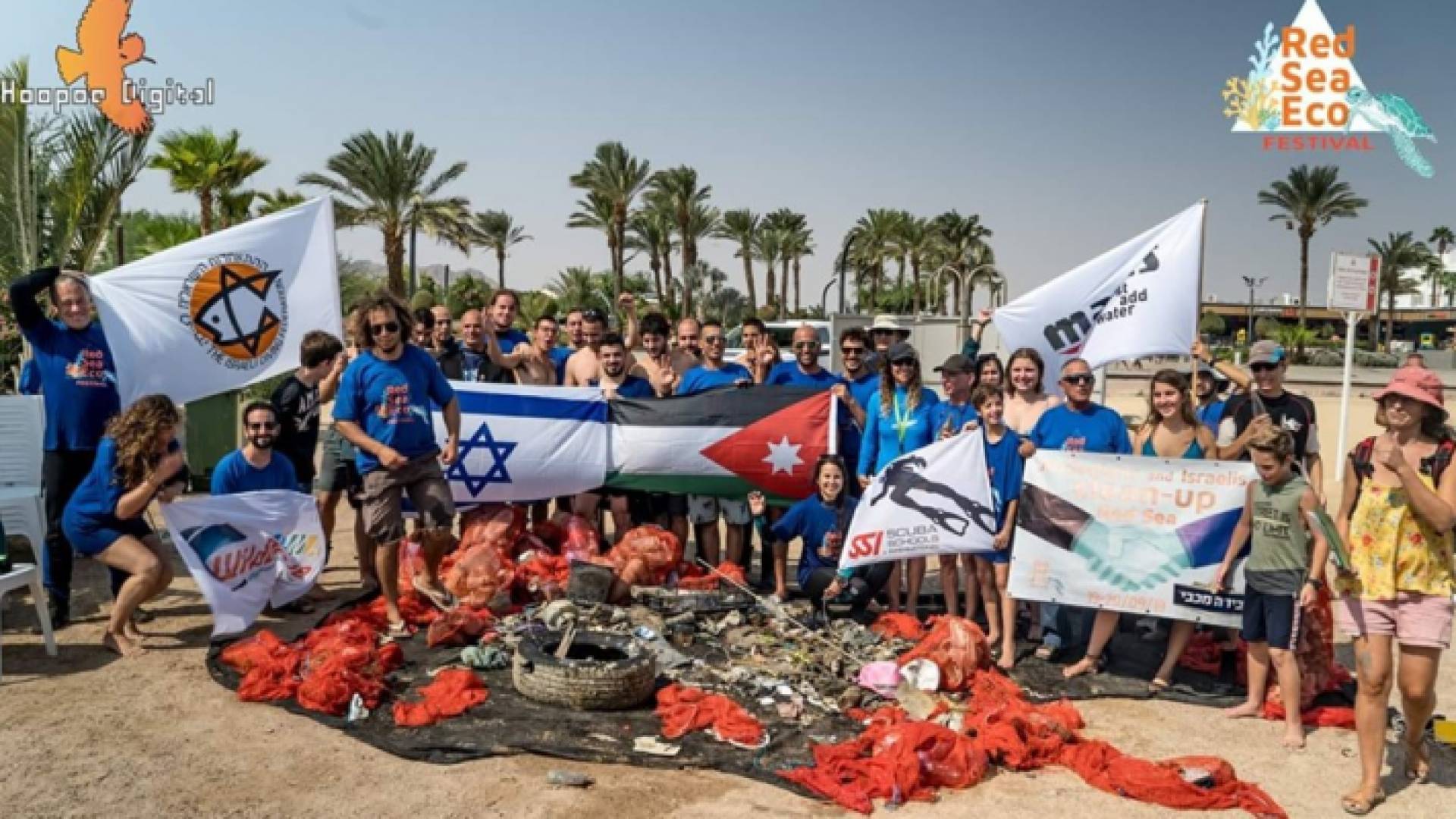 صورة جماعية لغواصين من الأردن وكيان الاحتلال