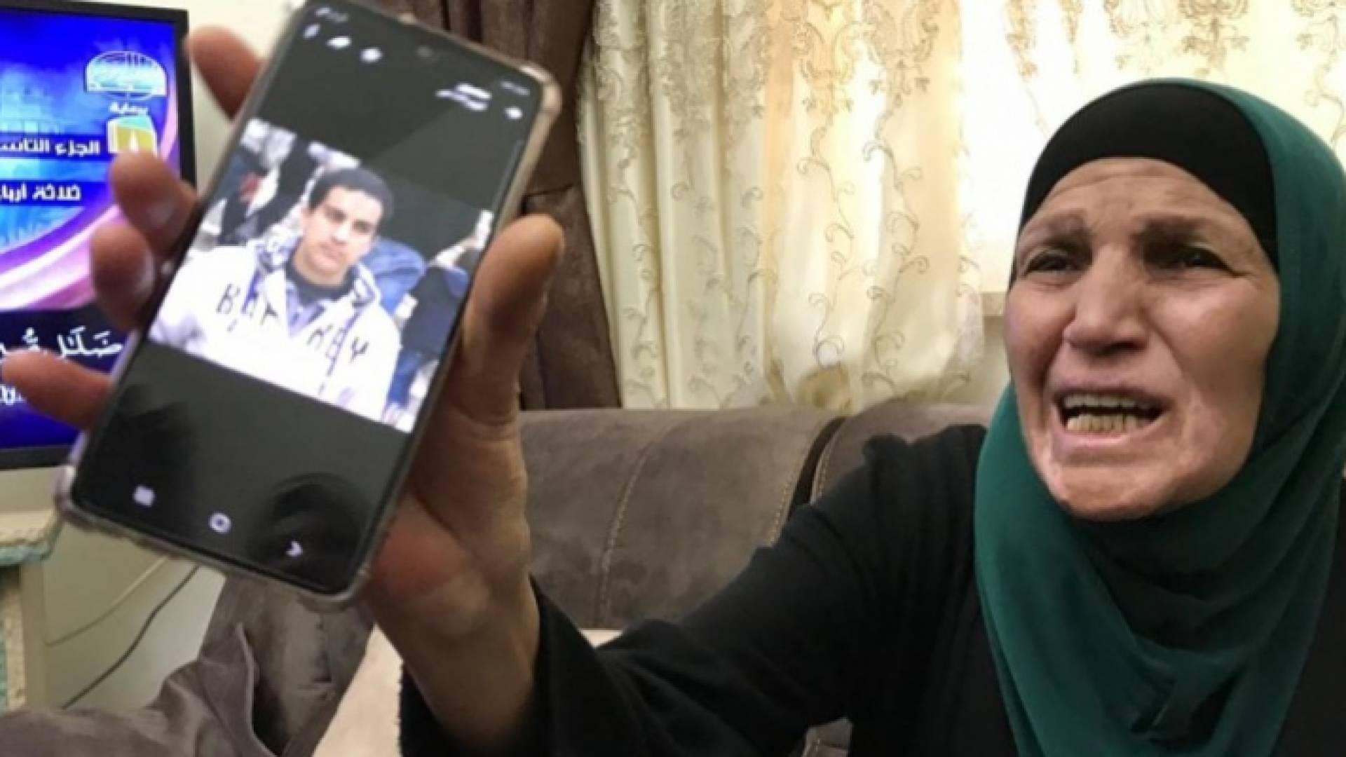 والدة الشهيد إياد خيري الحلاق