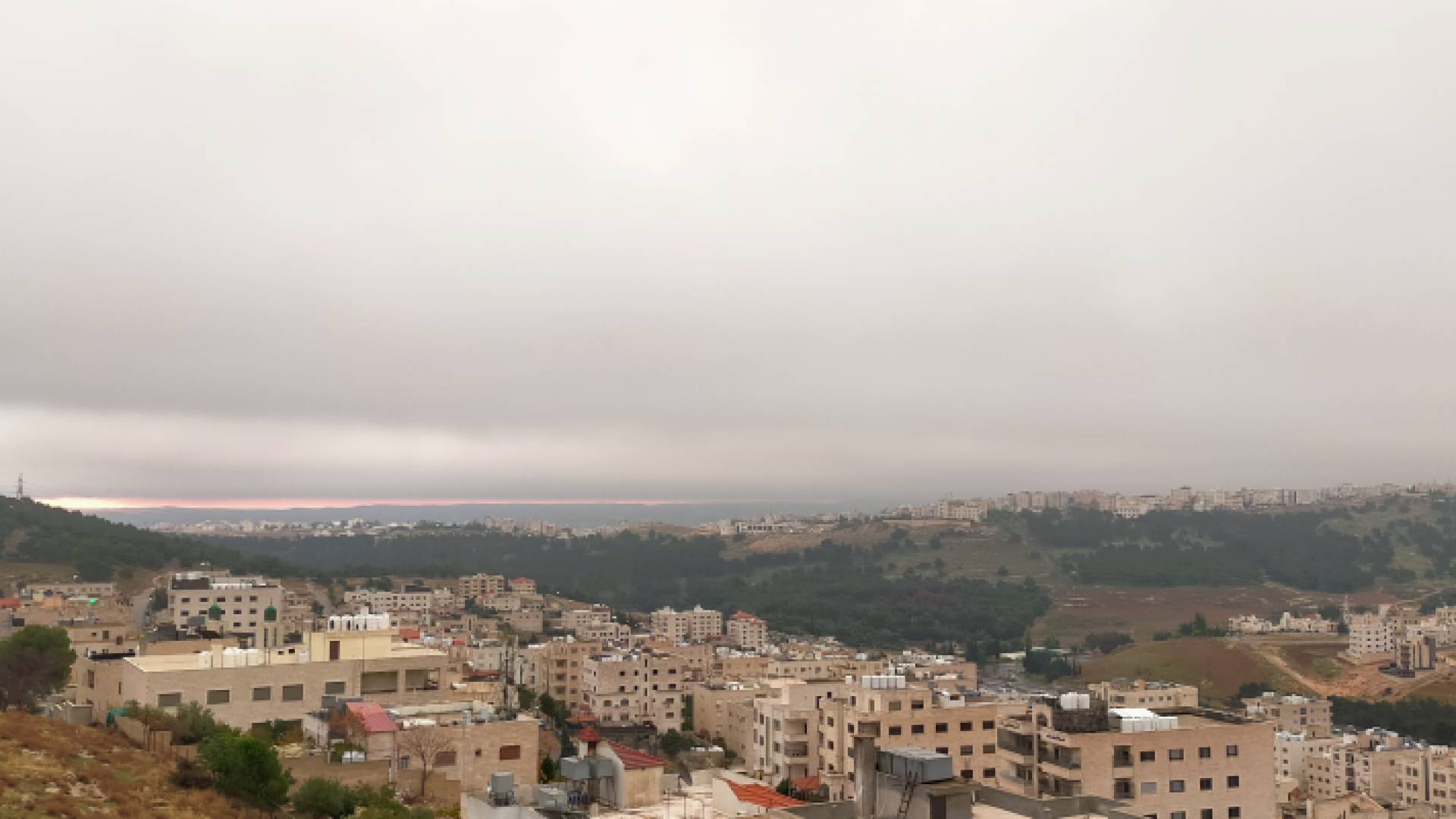 من الحالة الجوية