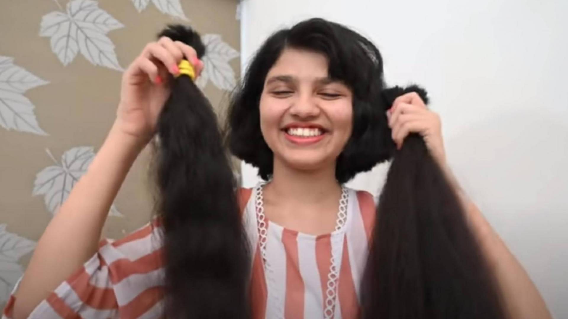 صاحبة أطول شعر بالعالم