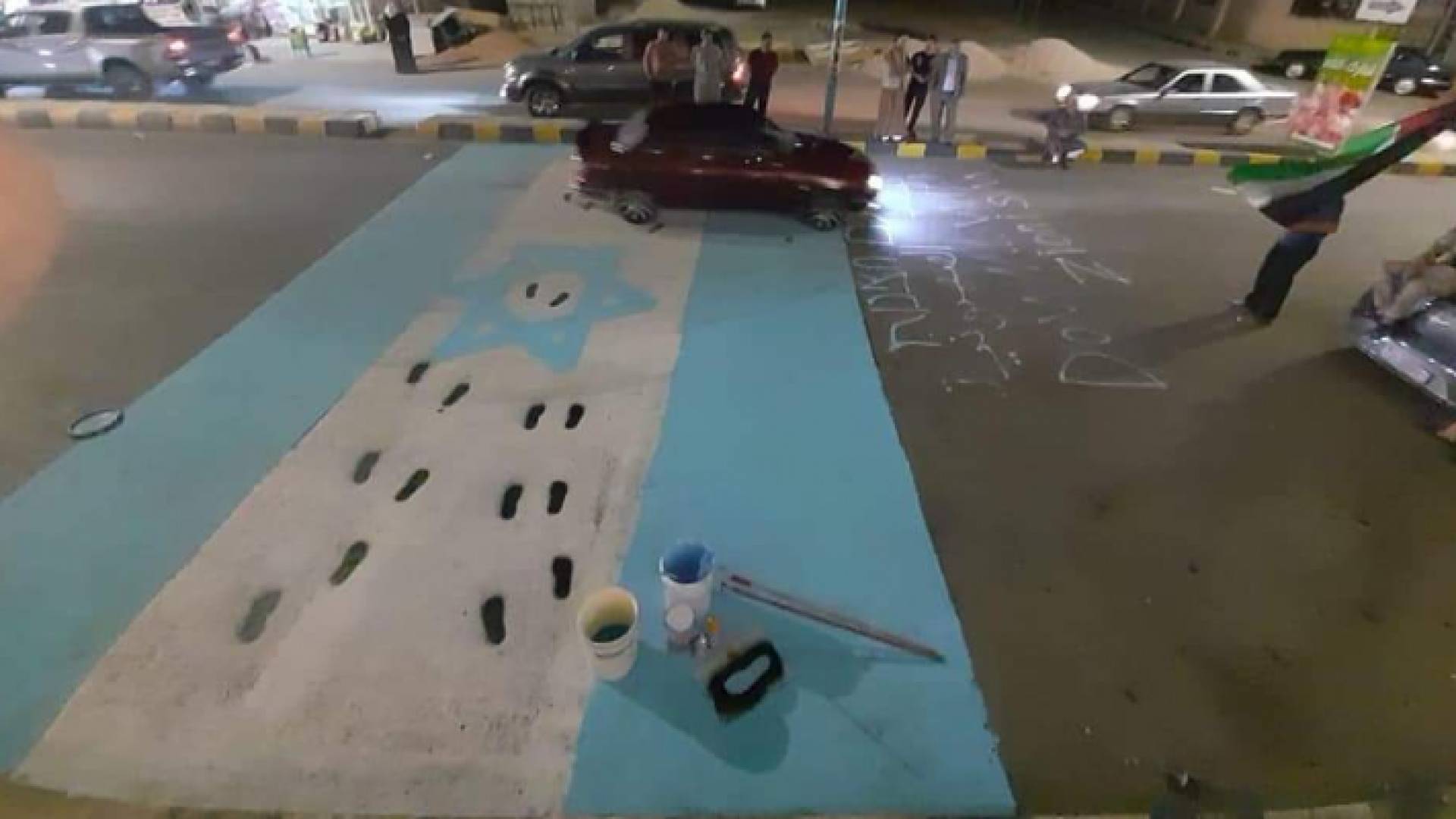 أحد شوارع محافظة معان بعد رسم علم الاحتلال الإسرائيلي