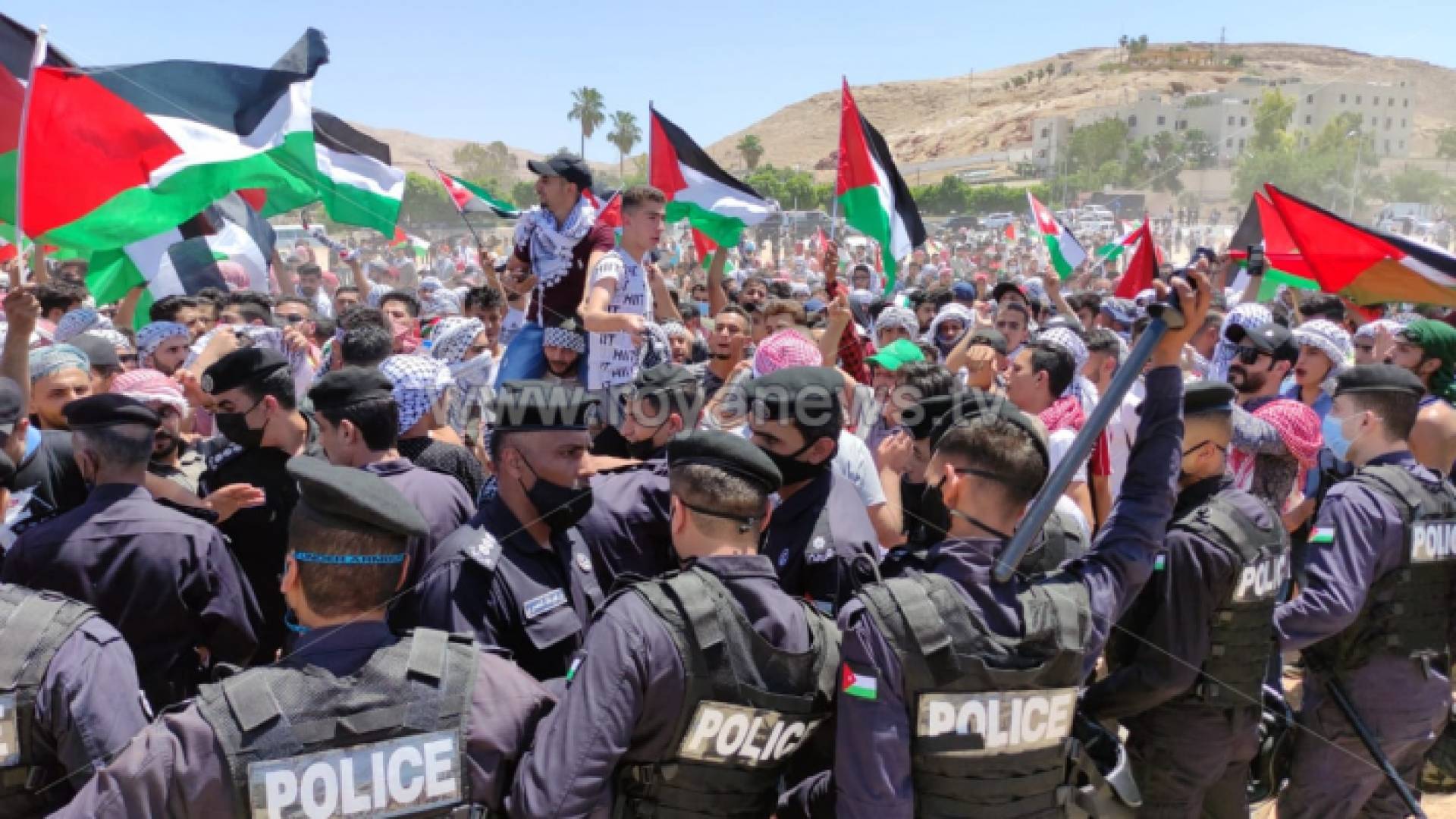 جانب من المسيرة قرب الحدود الأردنية الفلسطينية