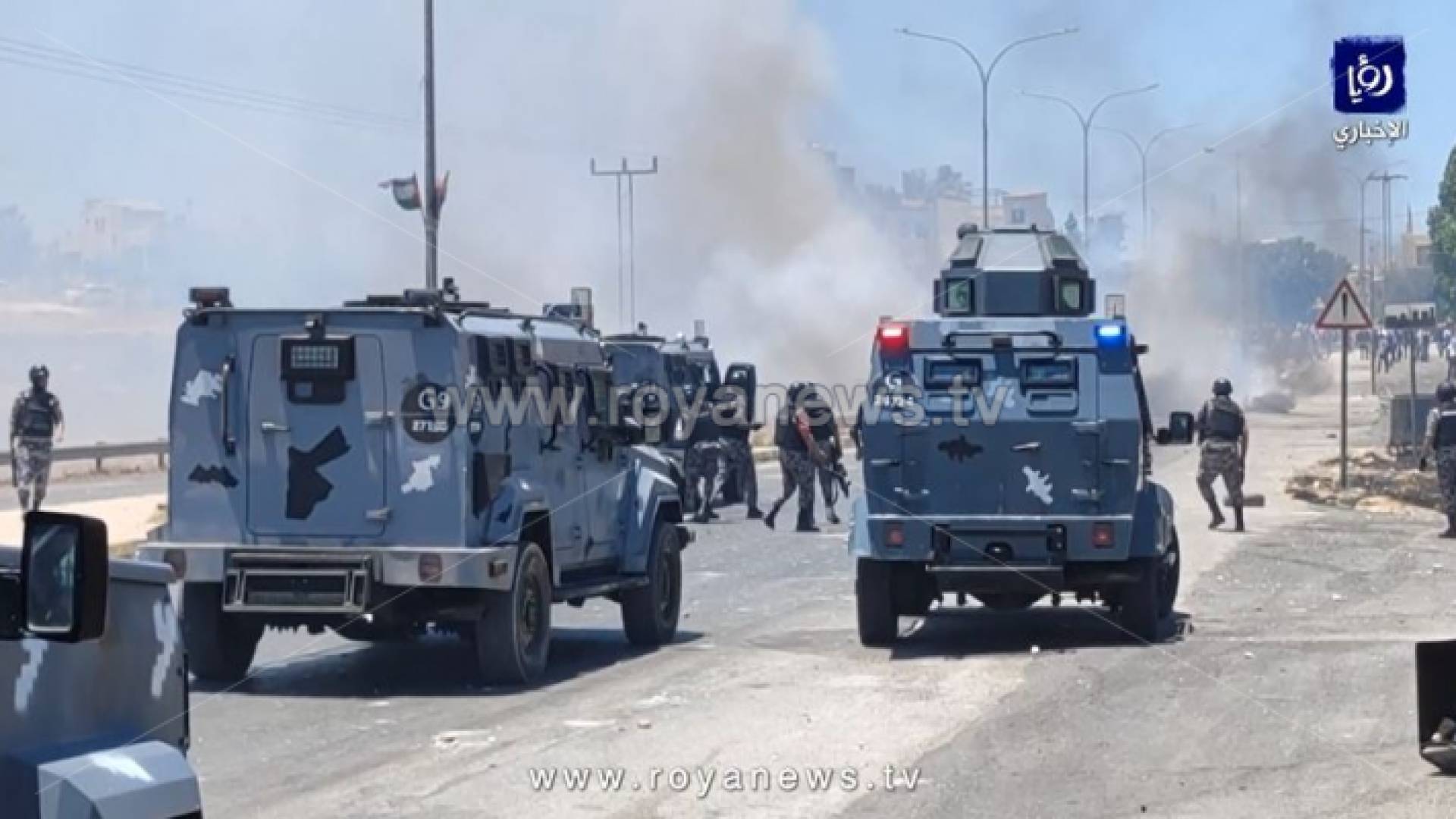 الصورة من تعامل الامن العام مع أعمال الشغب