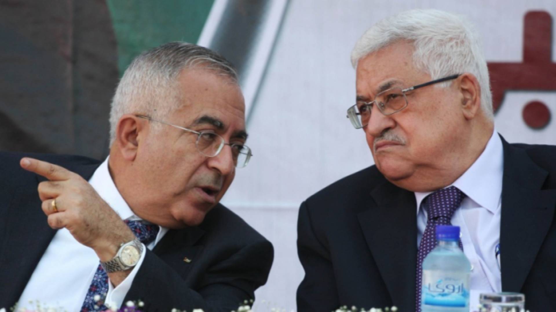 الرئيس الفلسطيني محمود عباس وسلام فياض