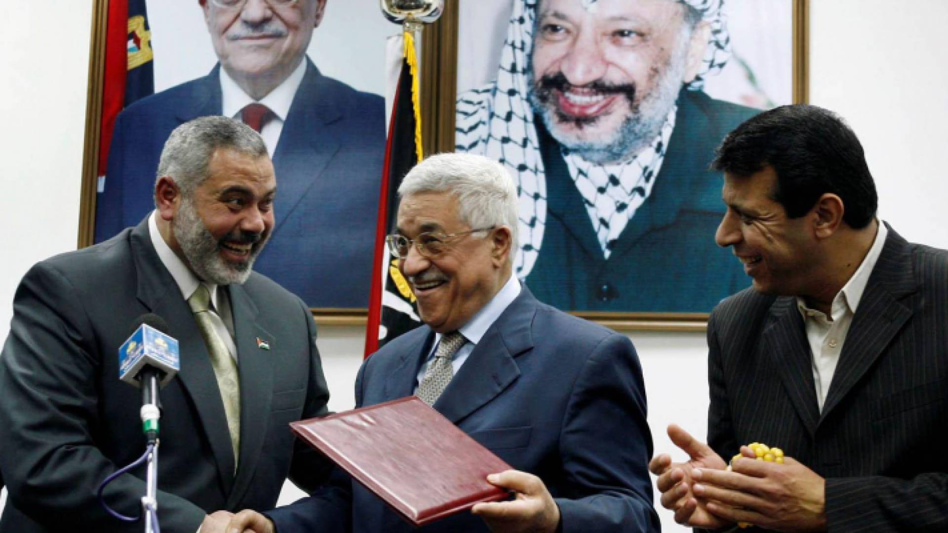 محمد دحلان والرئيس الفلسطيني وإسماعيل هنية
